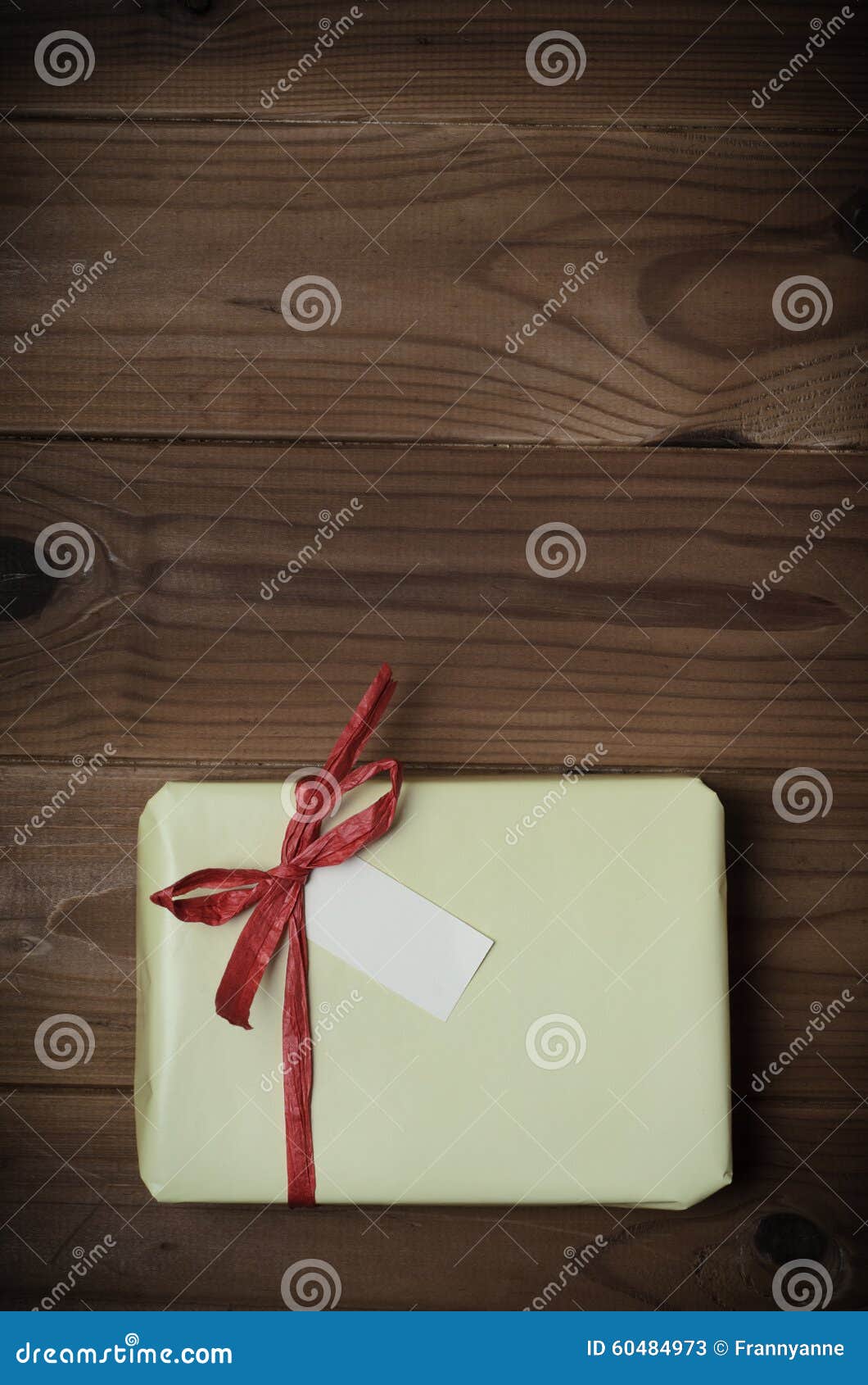 Wrapped Gift Package with Red Raffia Bow on Wood Planking - Retr Stock  Image - Image of portrait, appreciation: 60484973