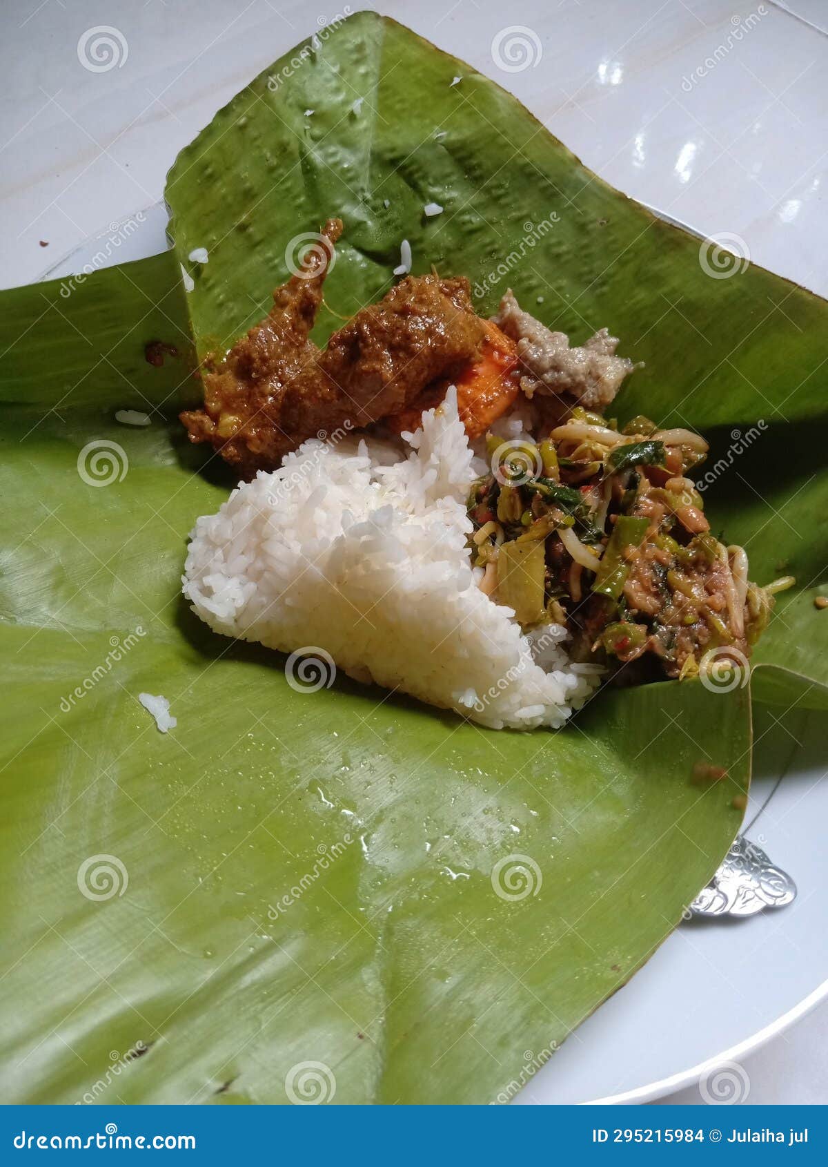 Wrapped Rice with Side Dishes of Chicken and Shrimp Stock Photo - Image