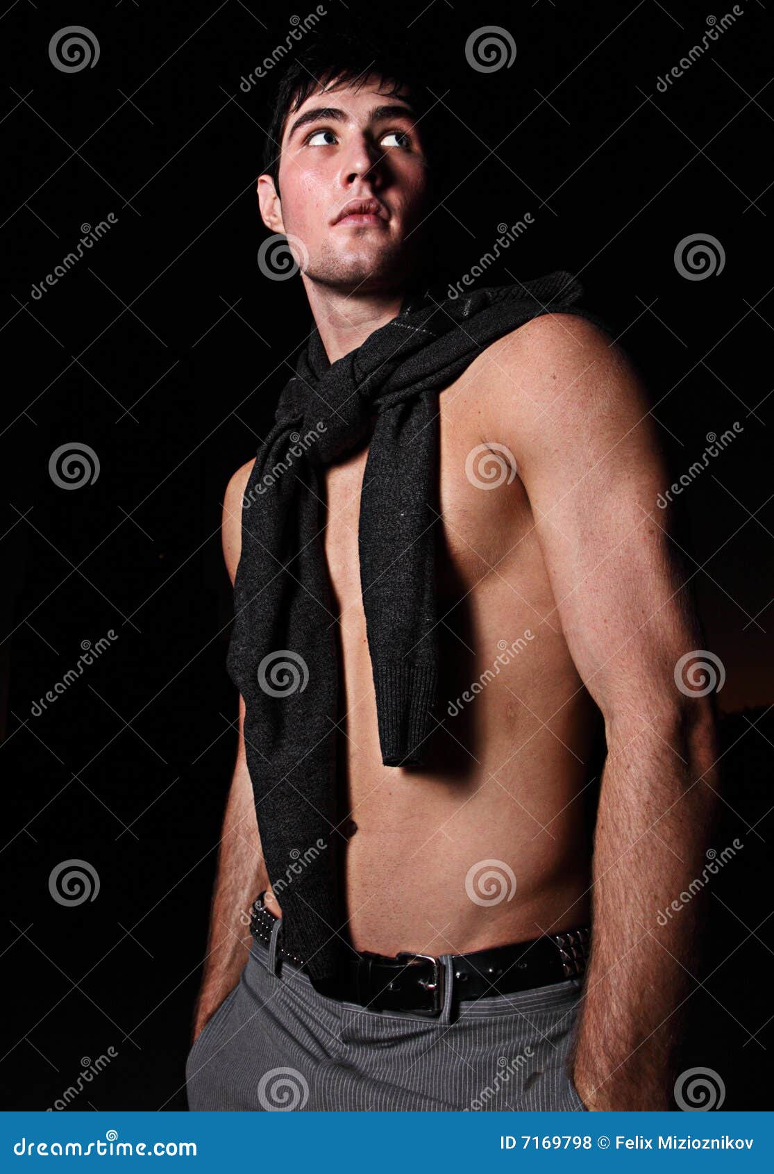 sweater tied around neck