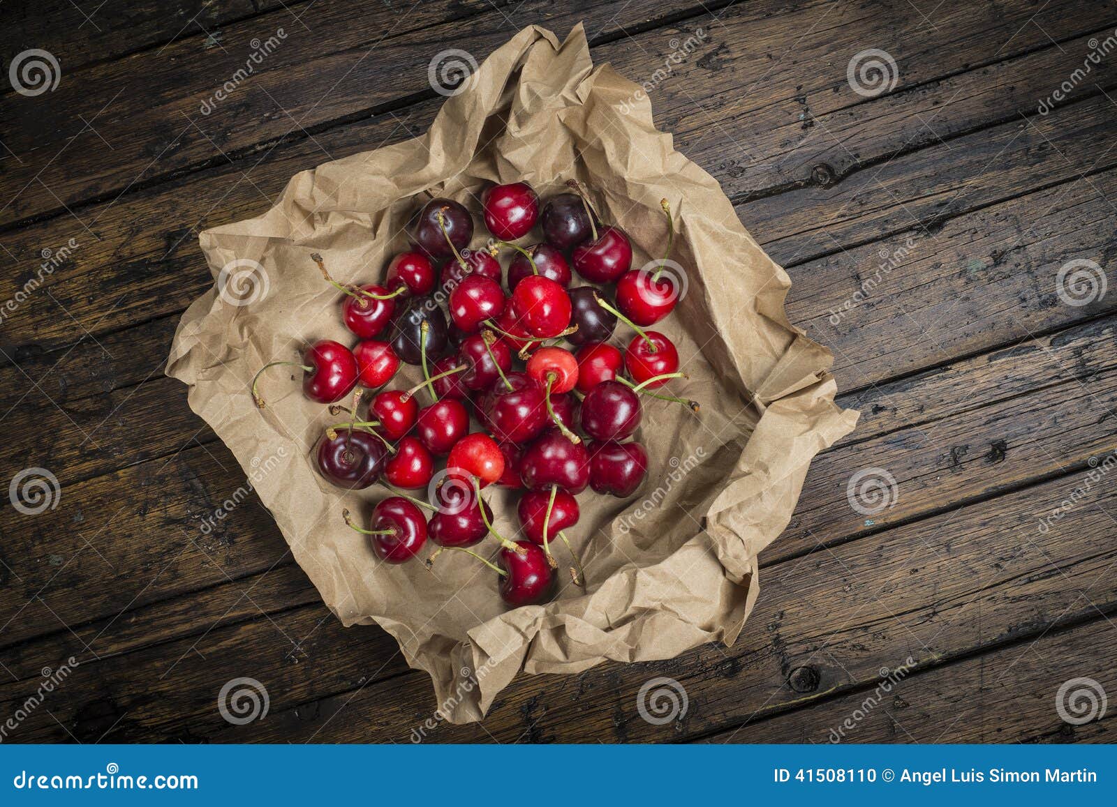 A Wrapping Paper with Cherries on the Table Stock Photo Image of