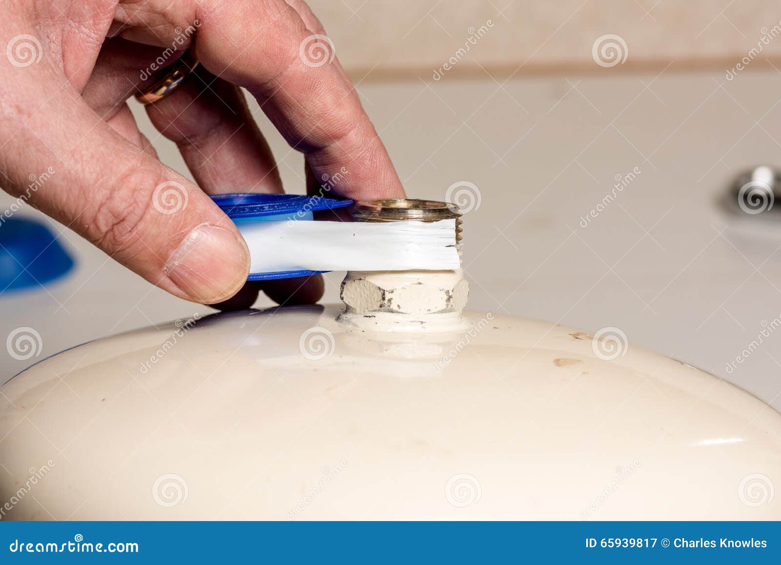 Wrapping Teflon Tape on a Hot Water Heater Stock Image Image of pipes