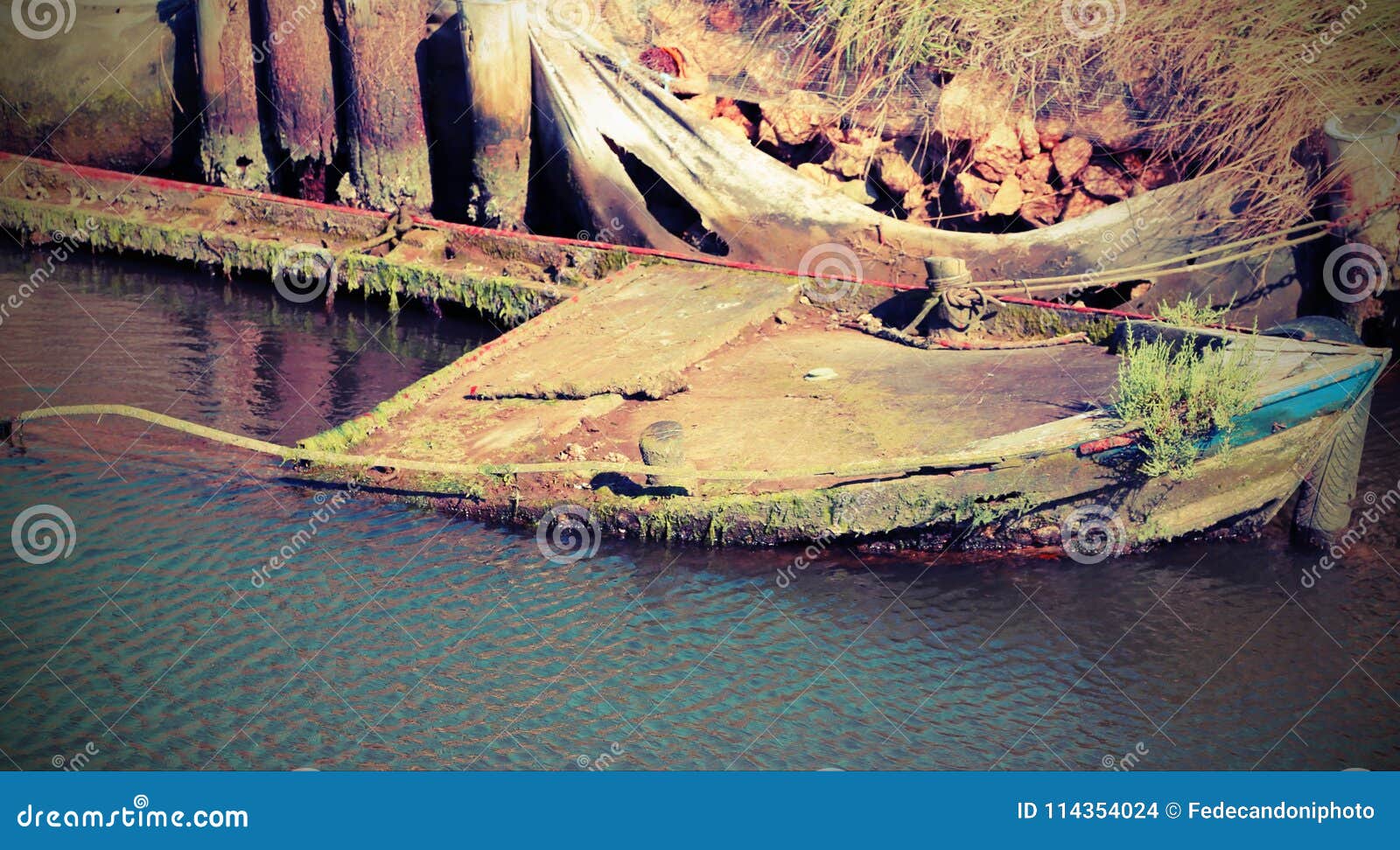 Wreck of a Sunken Fishing Boat with Vintage Effect Stock Photo - Image of  broken, abandon: 114354024