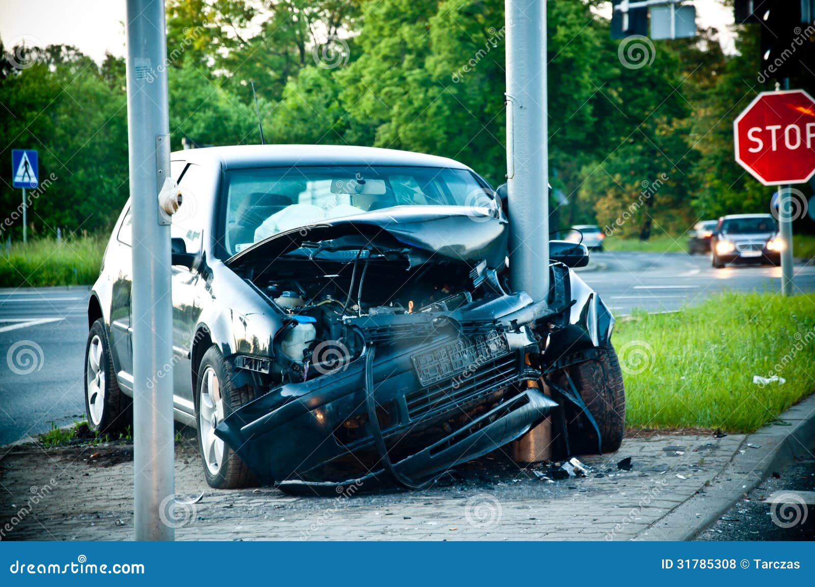 Wrecked Car After Hitting A Lamp Post Royalty Free Stock Photos - Image