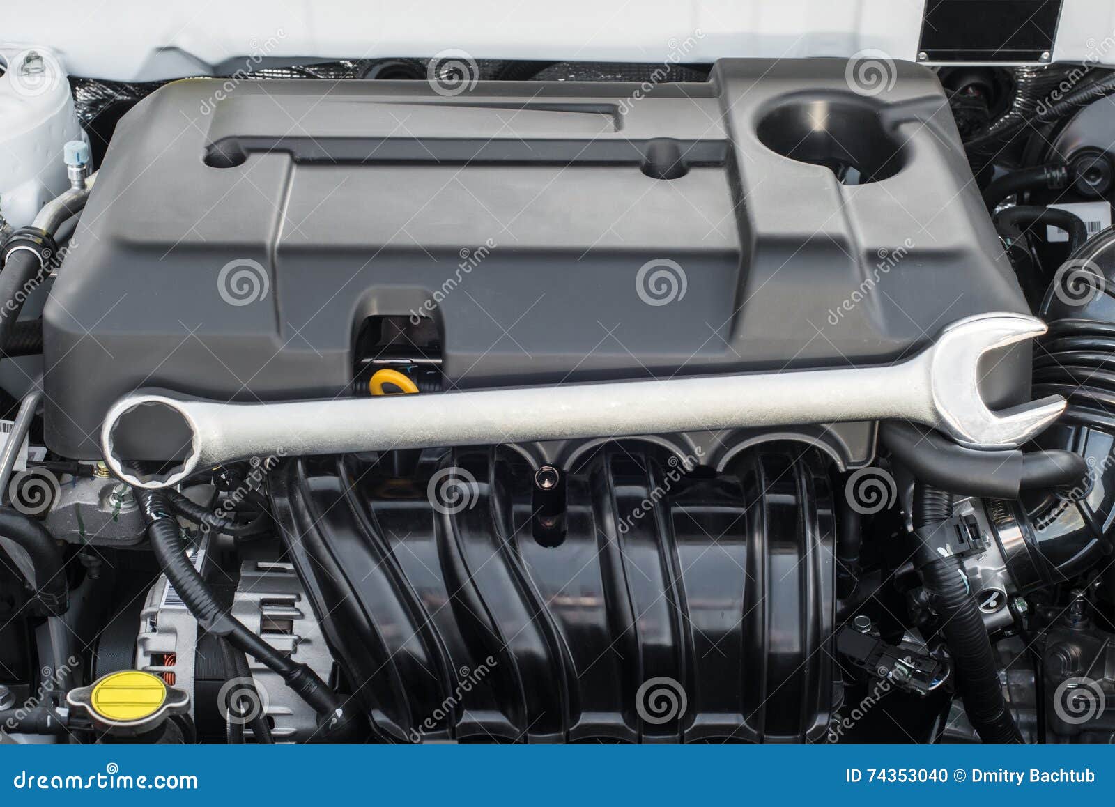 Wrench on car engine stock photo. Image of motor, industry 74353040