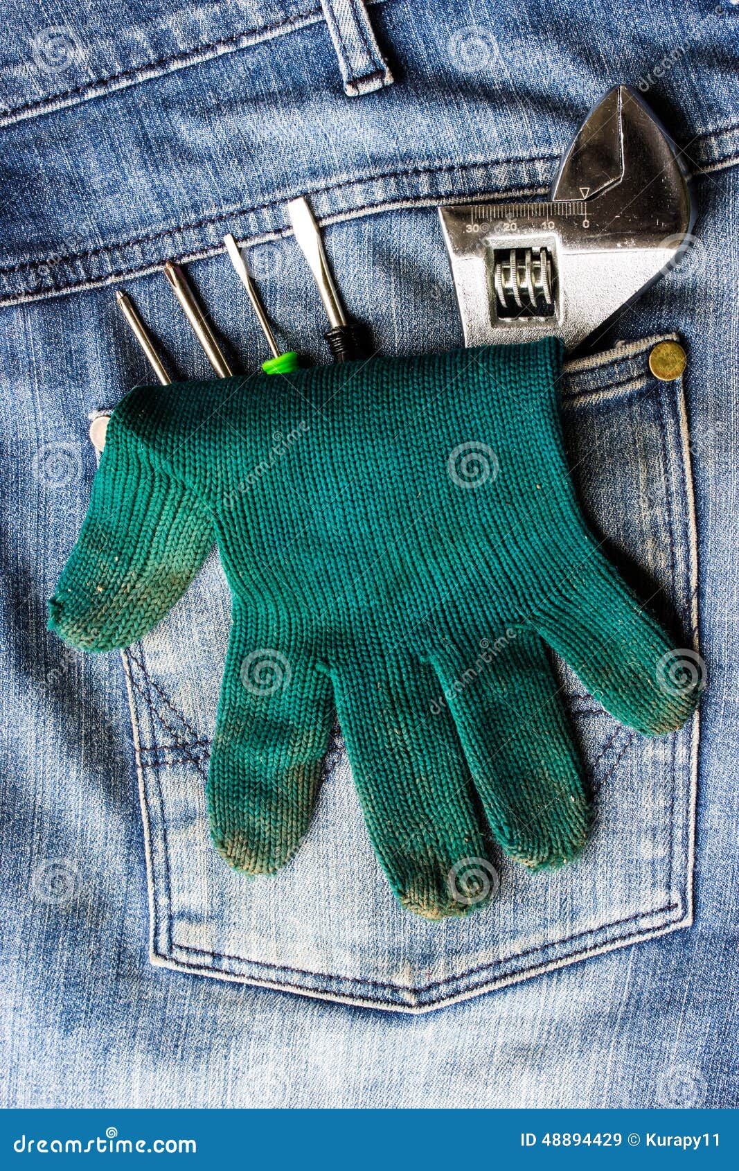 Wrench, Gloves and a Screwdriver in Jeans Stock Image Image of
