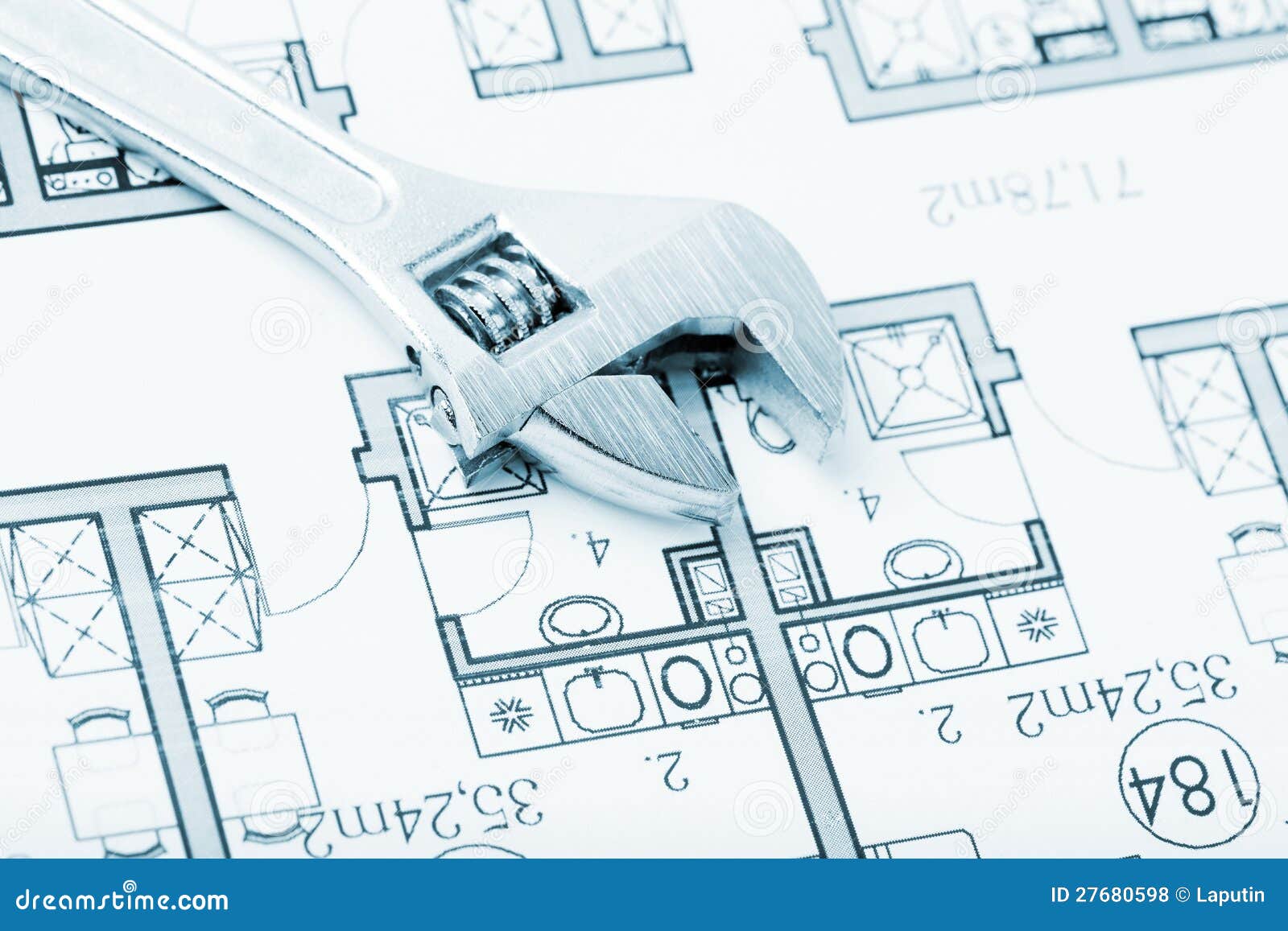 Wrench and plans stock photo. Image of closeup, paperwork 27680598