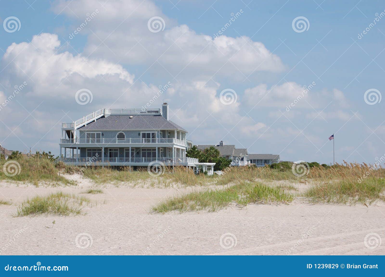Wrightsville Beach Condo stock image. Image of flag, clouds 1239829