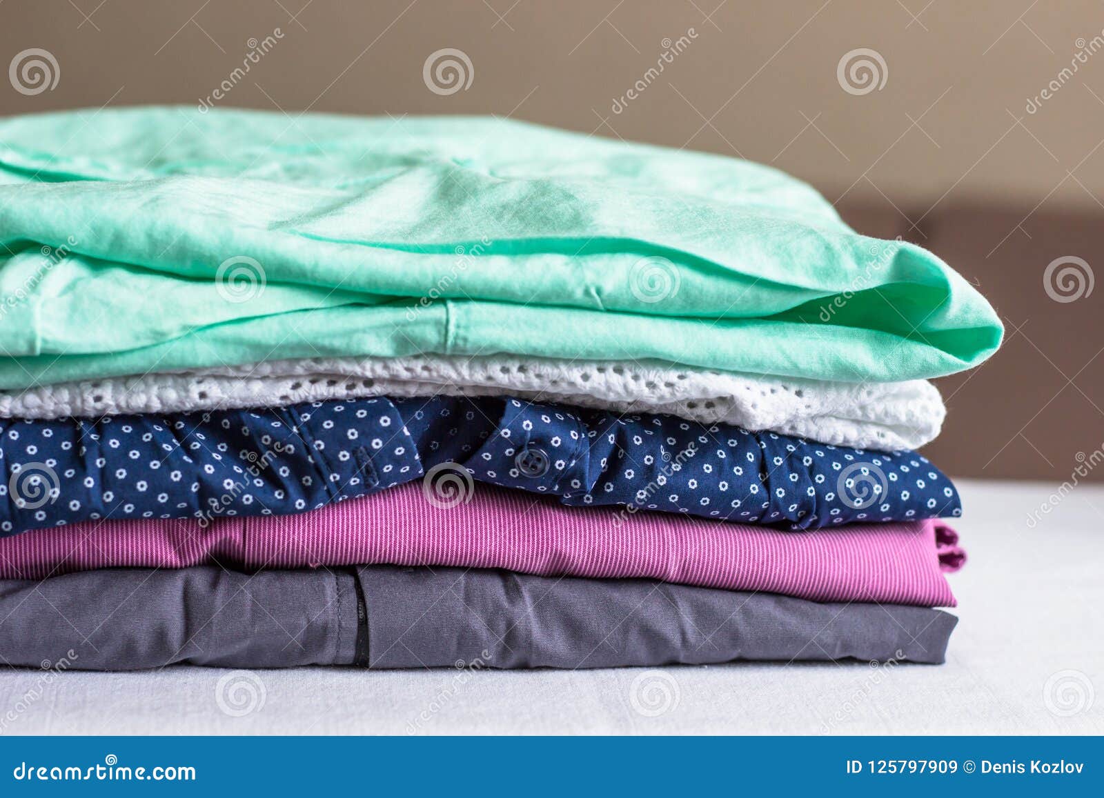 Wrinkled Clothes on the Ironing Board. Stock Image - Image of folded ...