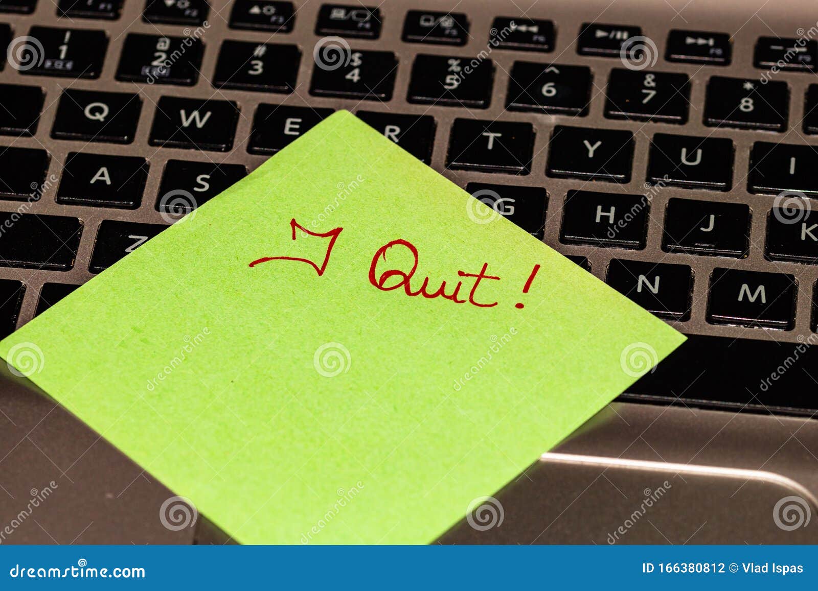 Writing on Colorful Sticky Note I Quit. Text with I Quit on Paper Stock