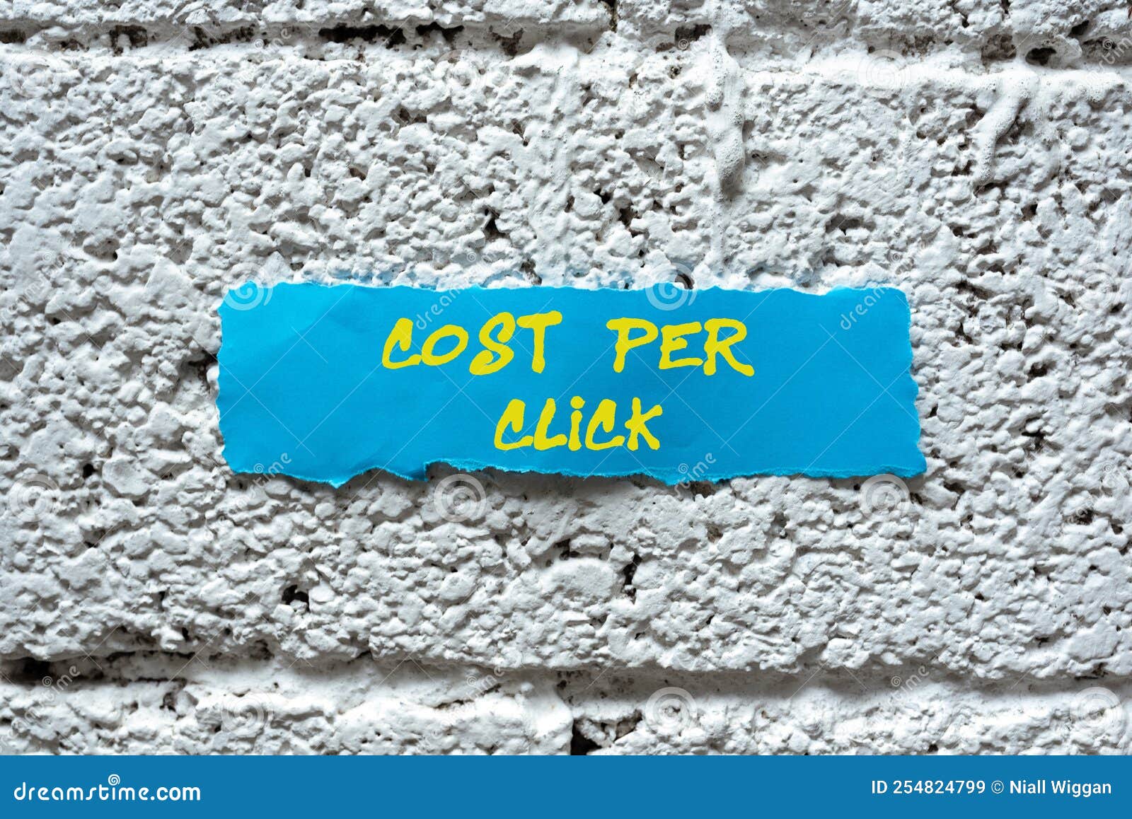 writing displaying text cost per click. internet concept pay an amount of money every time a person visits website lady