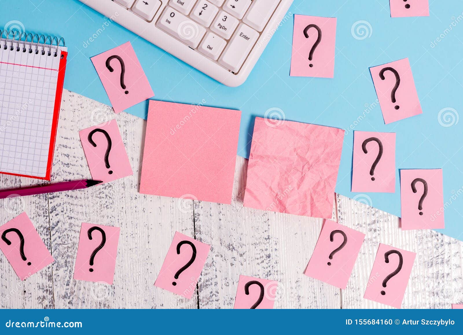 Writing Equipment and Computer Stuff Plus Scribbled Paper Placed on a