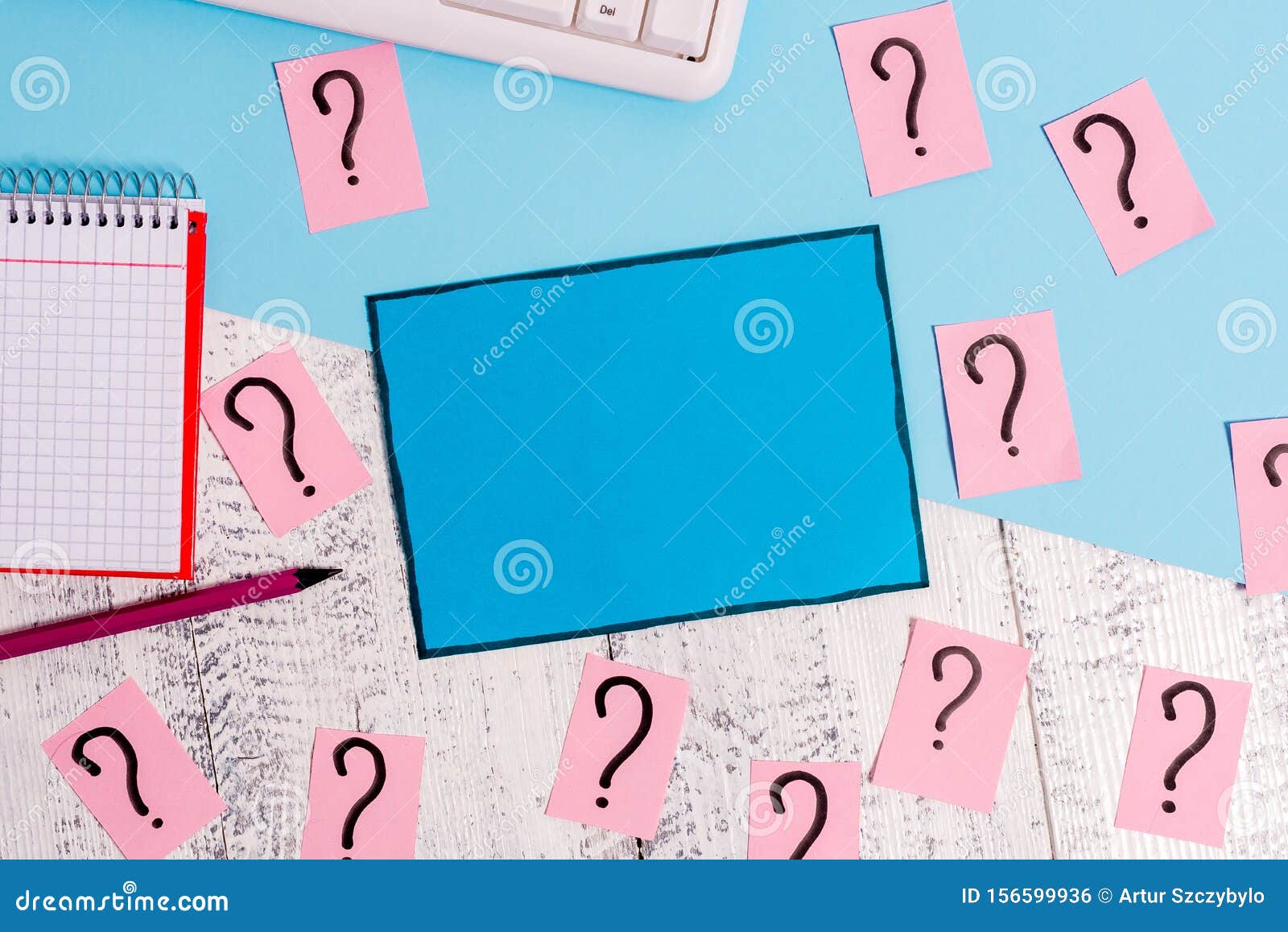 Writing Equipment and Computer Stuff Plus Scribbled Paper Placed on a