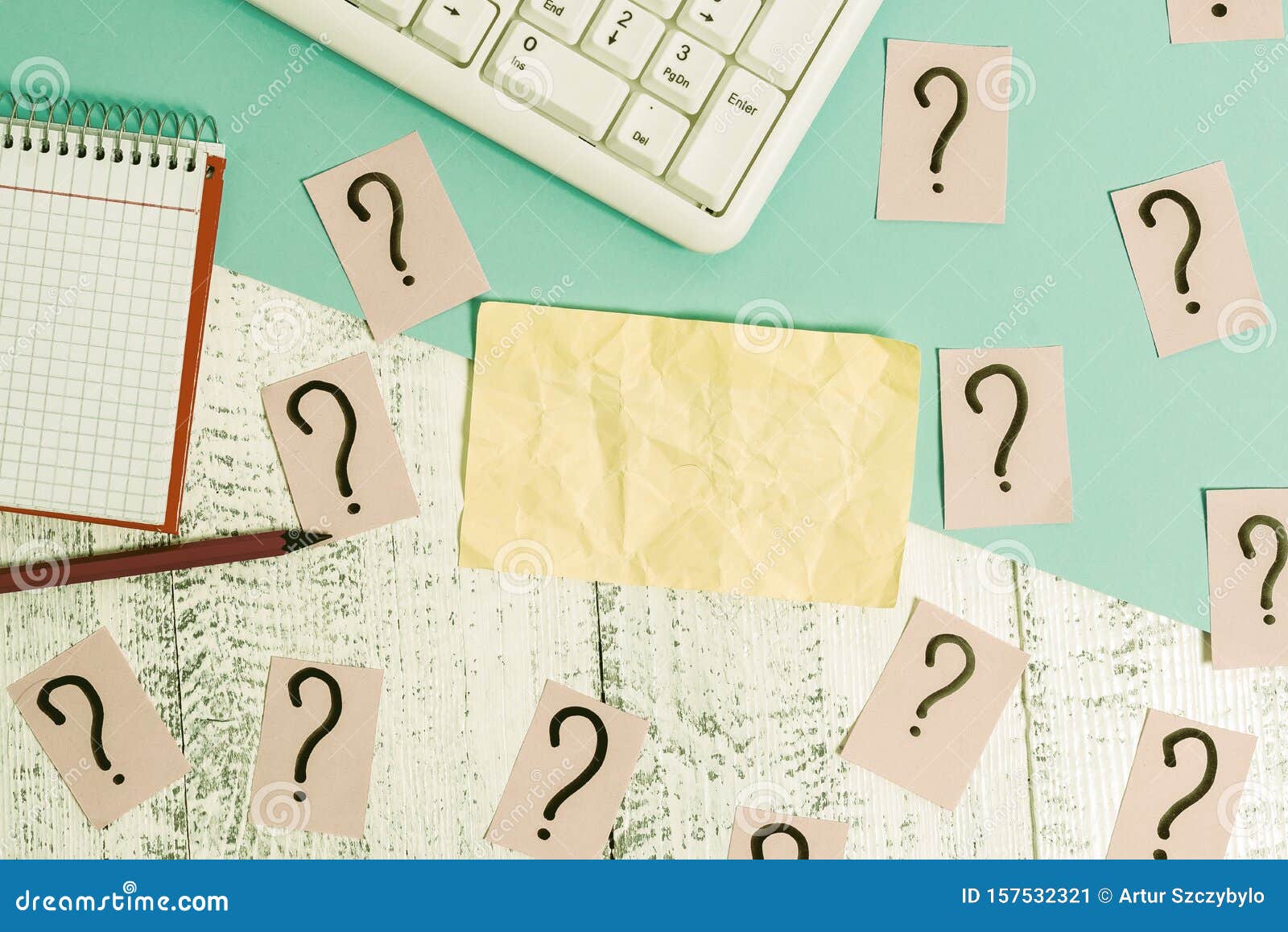 Writing Equipment and Computer Stuff Plus Scribbled Paper Placed on a