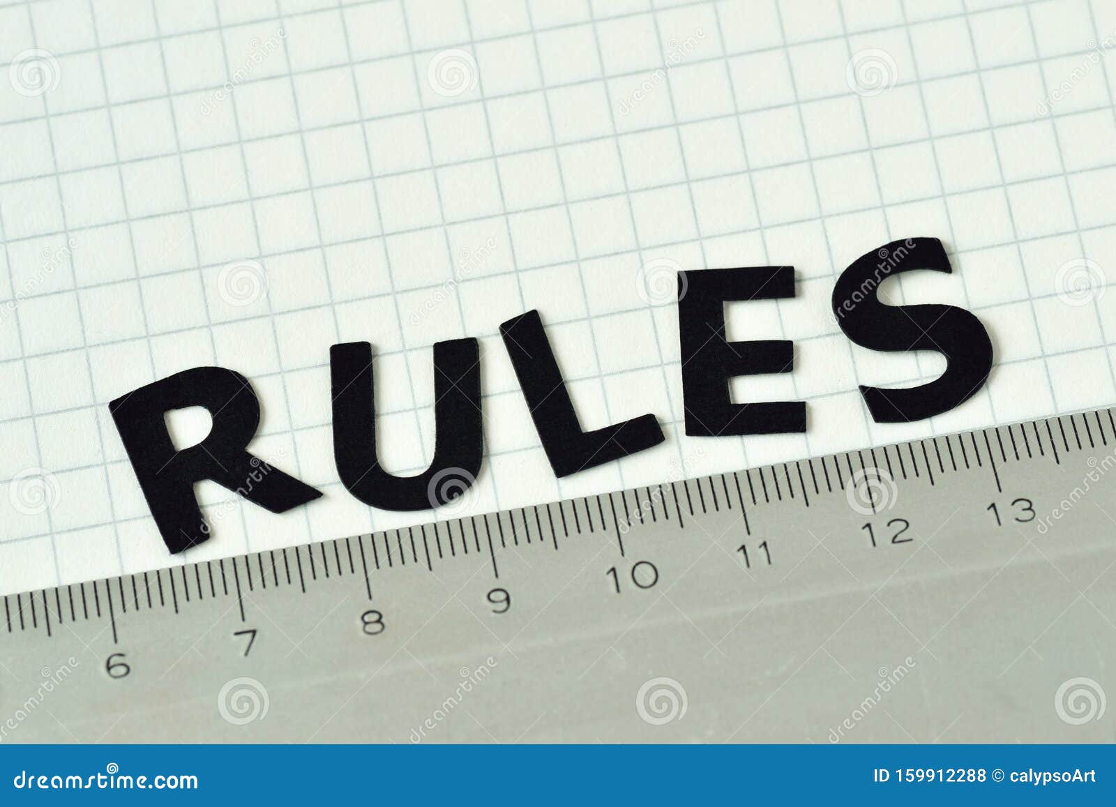 The Written Rules with Ruler on White Squared Paper Concept of Follow