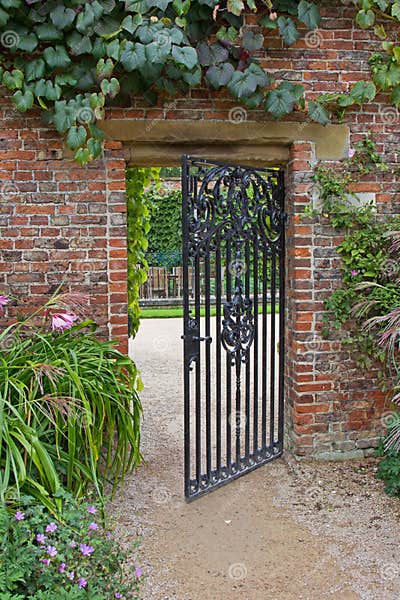 Wrought Iron Gate in Garden Stock Photo - Image of fence, gardening ...