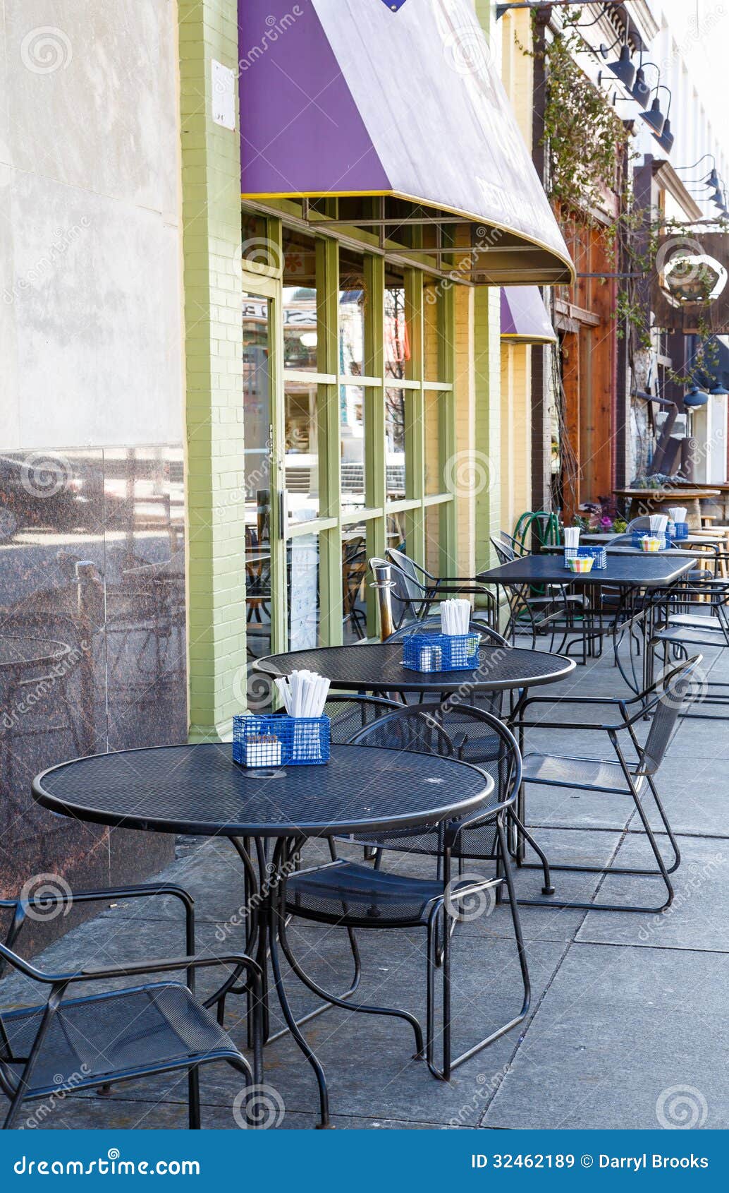 Wrought Iron Tables on Small Town Sidewalk Stock Image - Image of ...