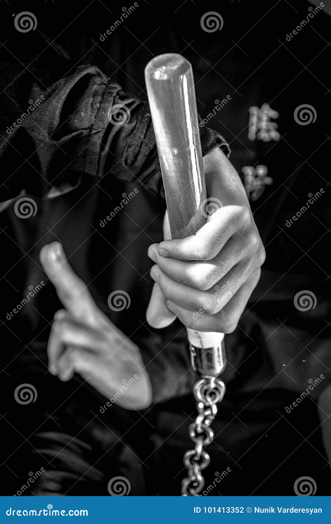 Wushu . Skill with Nunchuck. Stock Photo Image of martial, motion