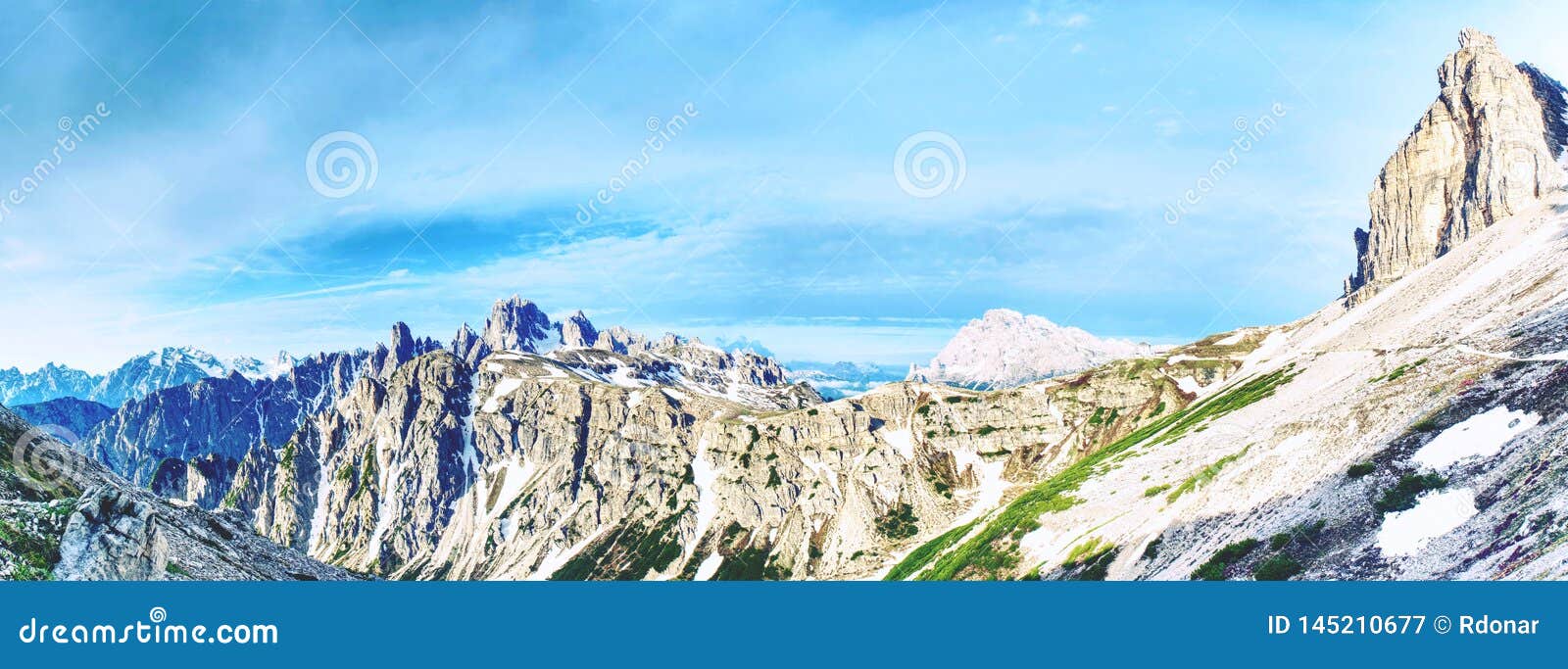 Hiking trail on background of stunning Alpine panorama. Hiking trail on the background of the stunning Alpine panorama. Alps Dolomites mountains, Dolomiti, Italy