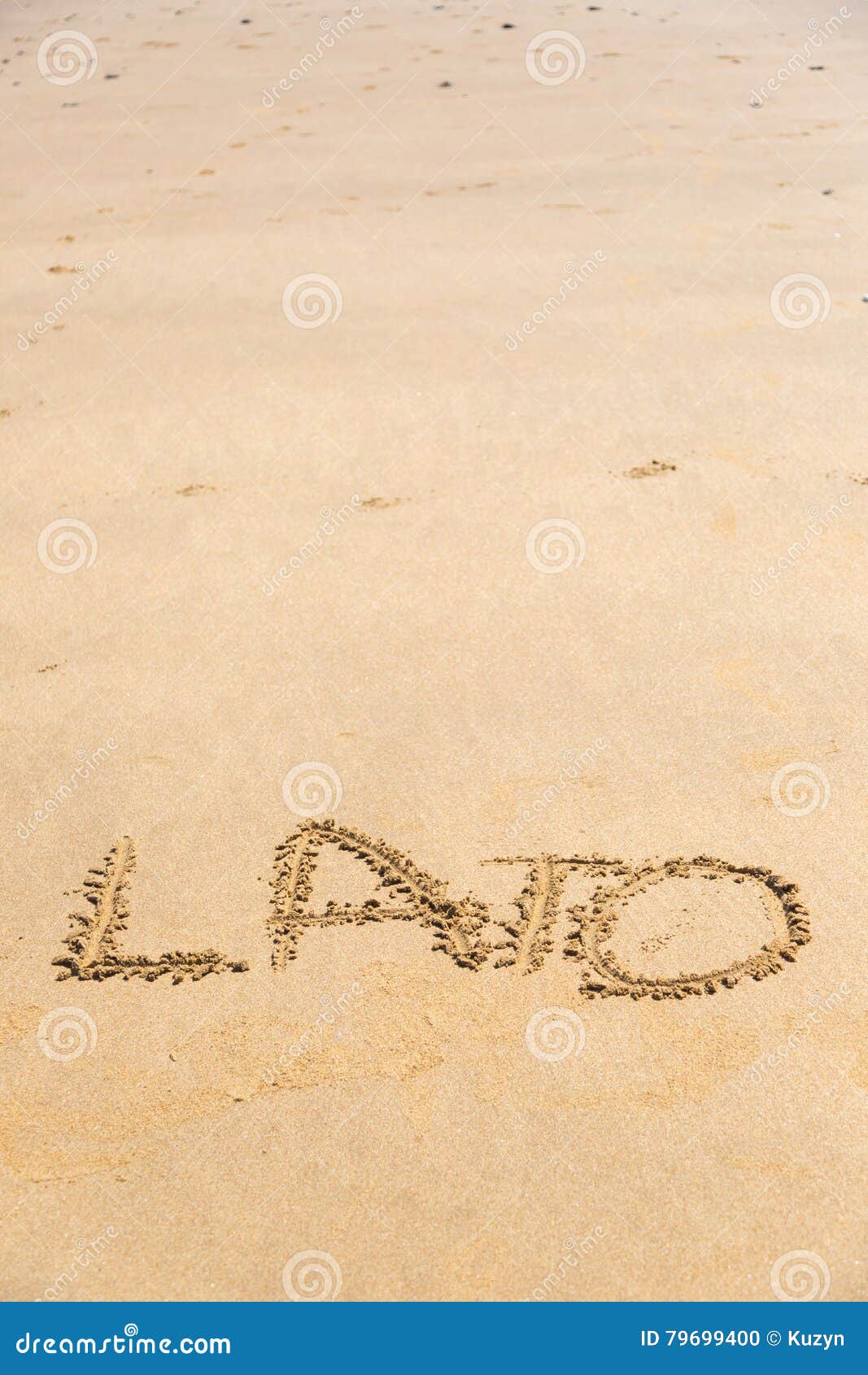 'lato' word written on sand