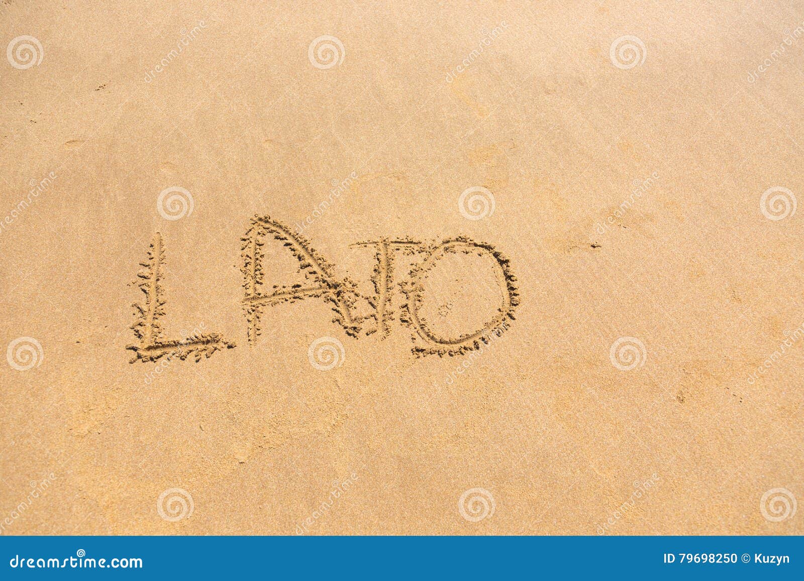 'lato' word written on sand