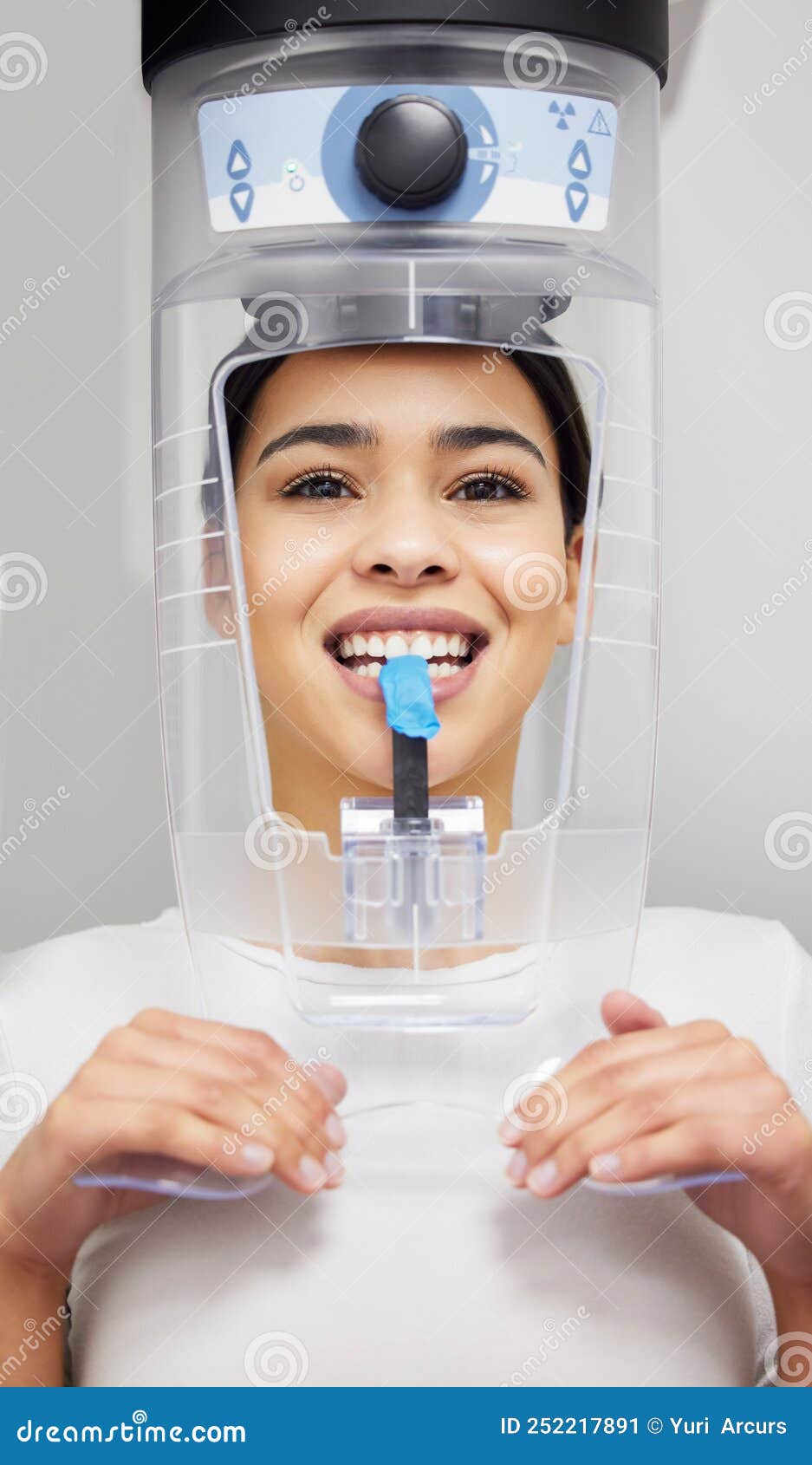 Xrays are a Standard Procedure at the Dentist. a Young Woman Using an