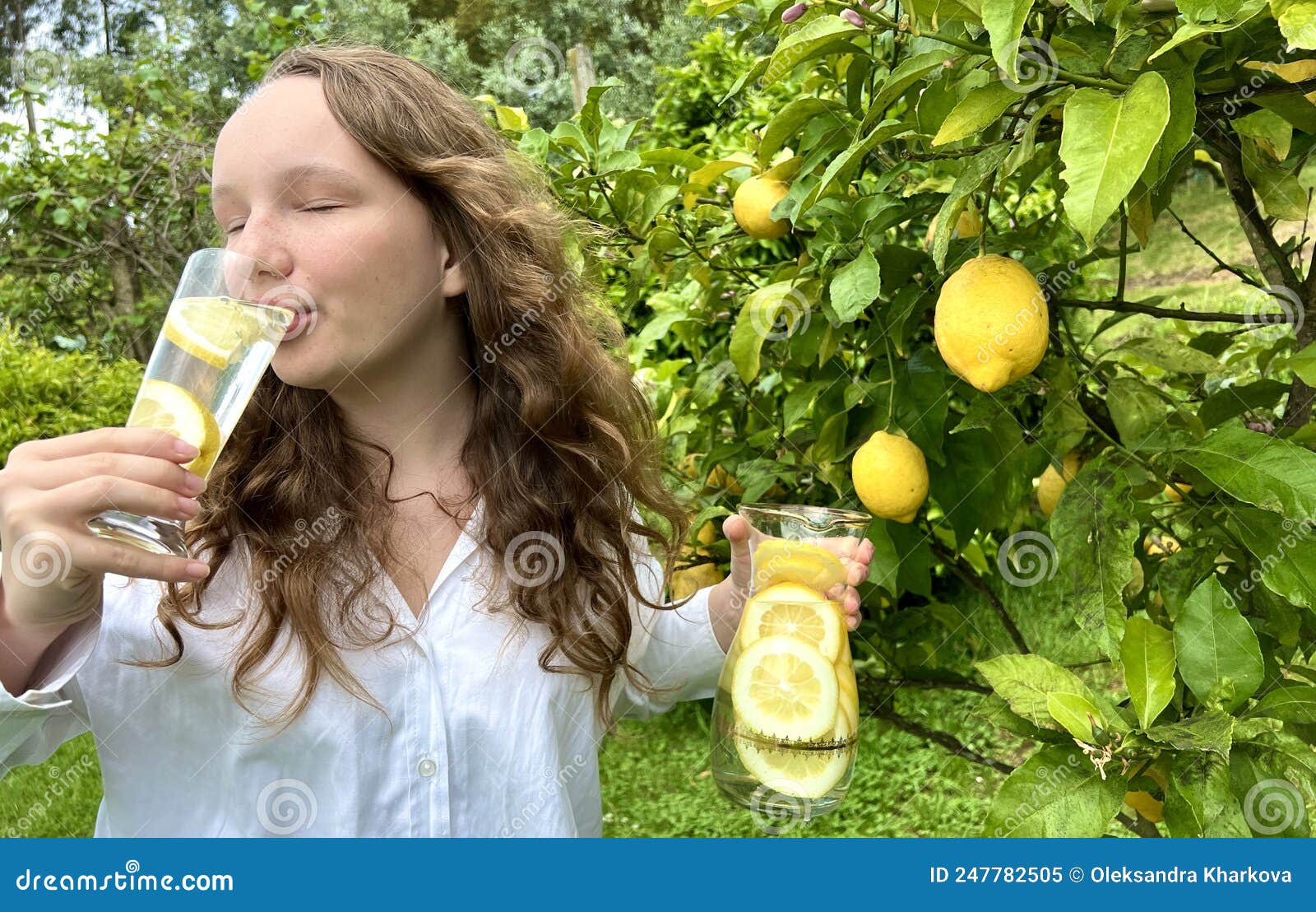 Its Just A Lemon Paradise A Teenage Girl Stands Against The Backdrop