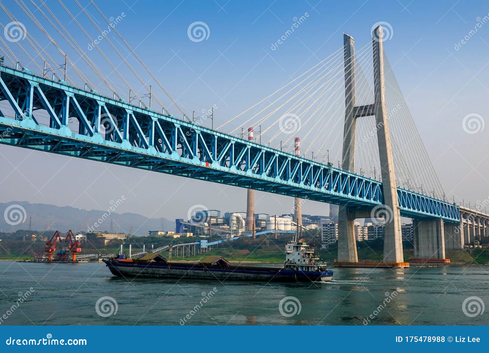 new baishatuo yangtze river railway bridge under blue sky