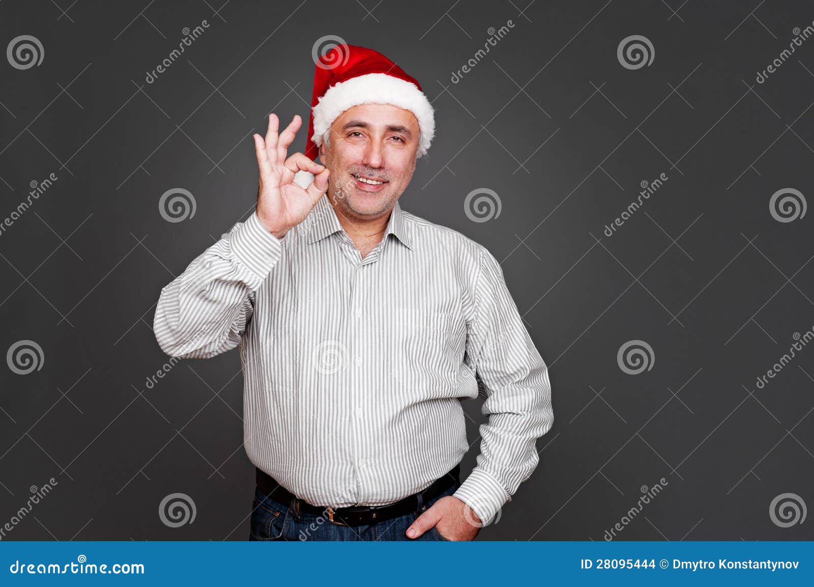 Xmas man showing ok sign stock photo. Image of christmas 28095444