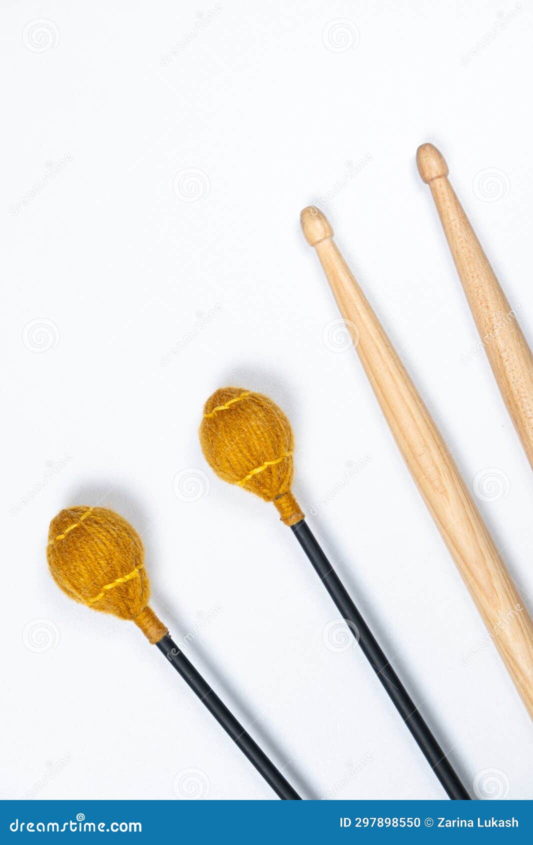 Xylophone and Drum Sticks on White Background Top View Stock Photo
