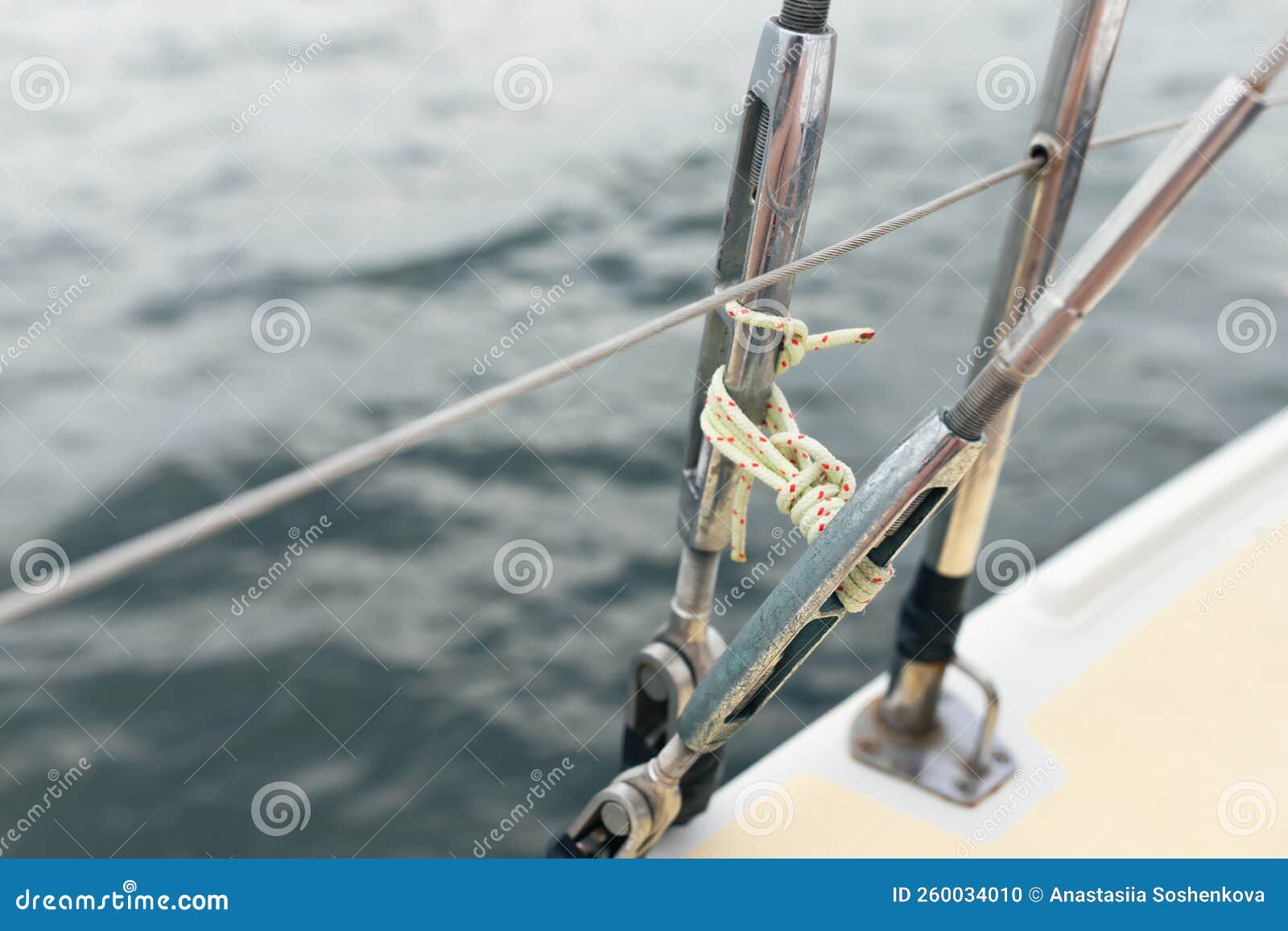 Yacht Accessories, Rope on the Metal Rope of the Boat. Stock Photo Image of closeup, ocean