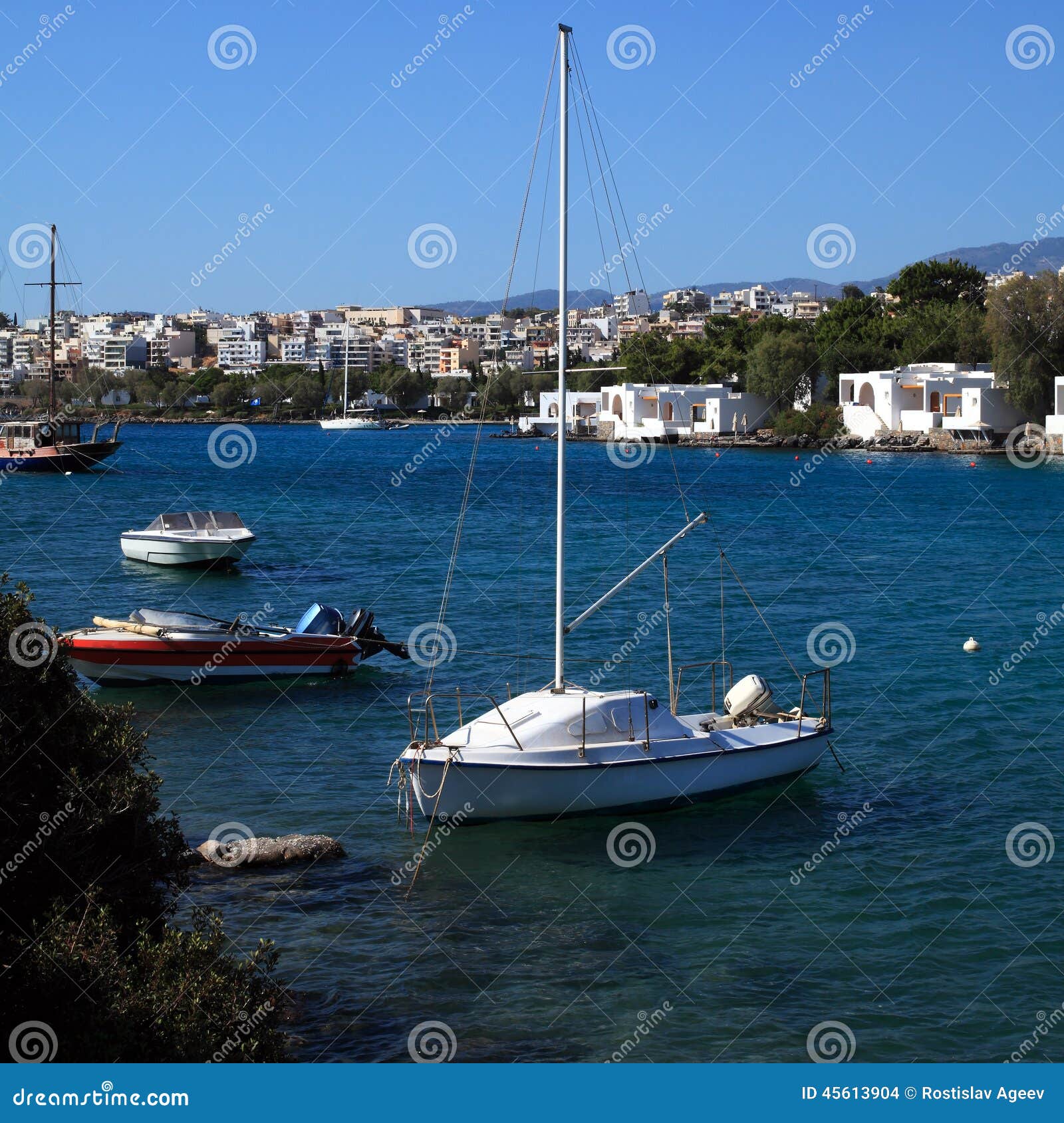 Yacht and Agios Nikolaos City, Crete, Greece