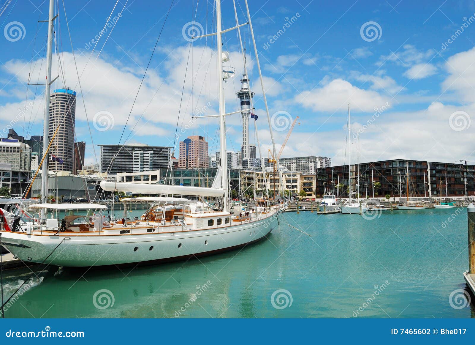 Yacht at Auckland harbor stock photo. Image of buildings 7465602