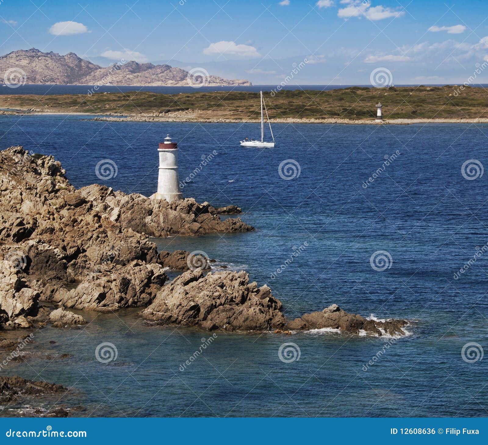 Yacht and lighthouse stock photo. Image of coast, cervo 12608636