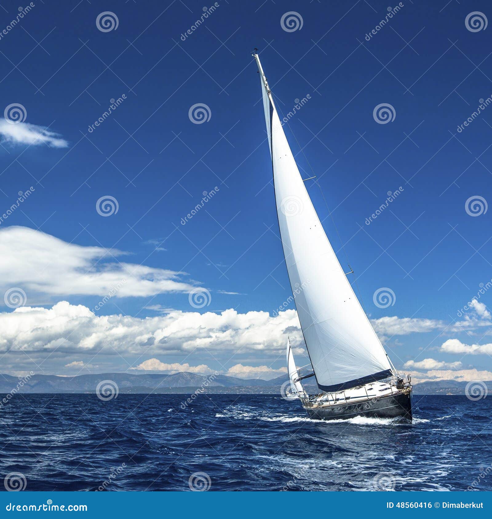 yacht sails with beautiful cloudless sky. sailing.