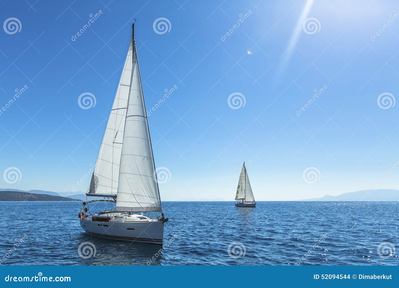 yachting. tourism. luxury lifestyle. ship yachts with white sails in the open sea.