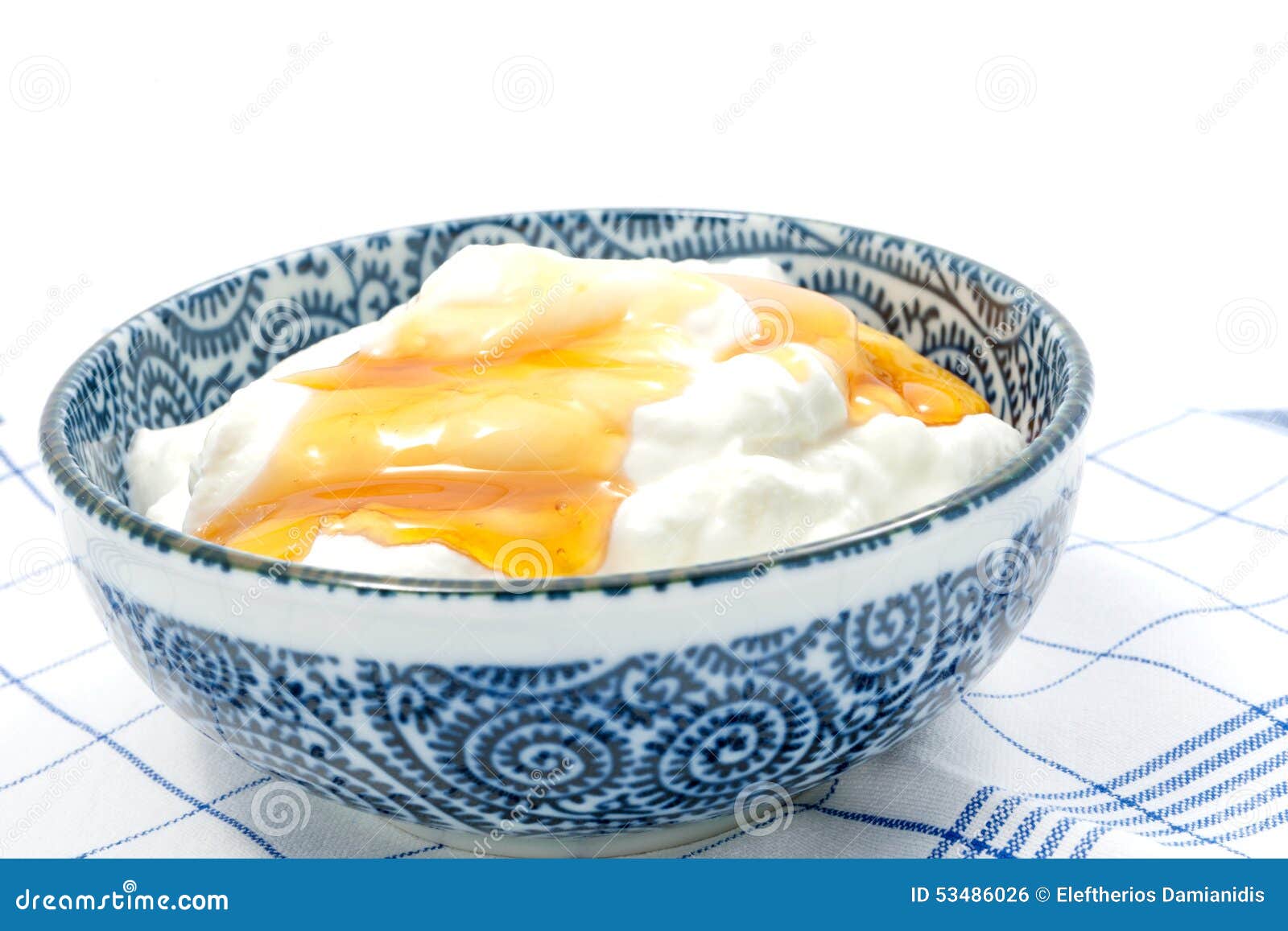 Yaourt Grec avec du miel dans un pot