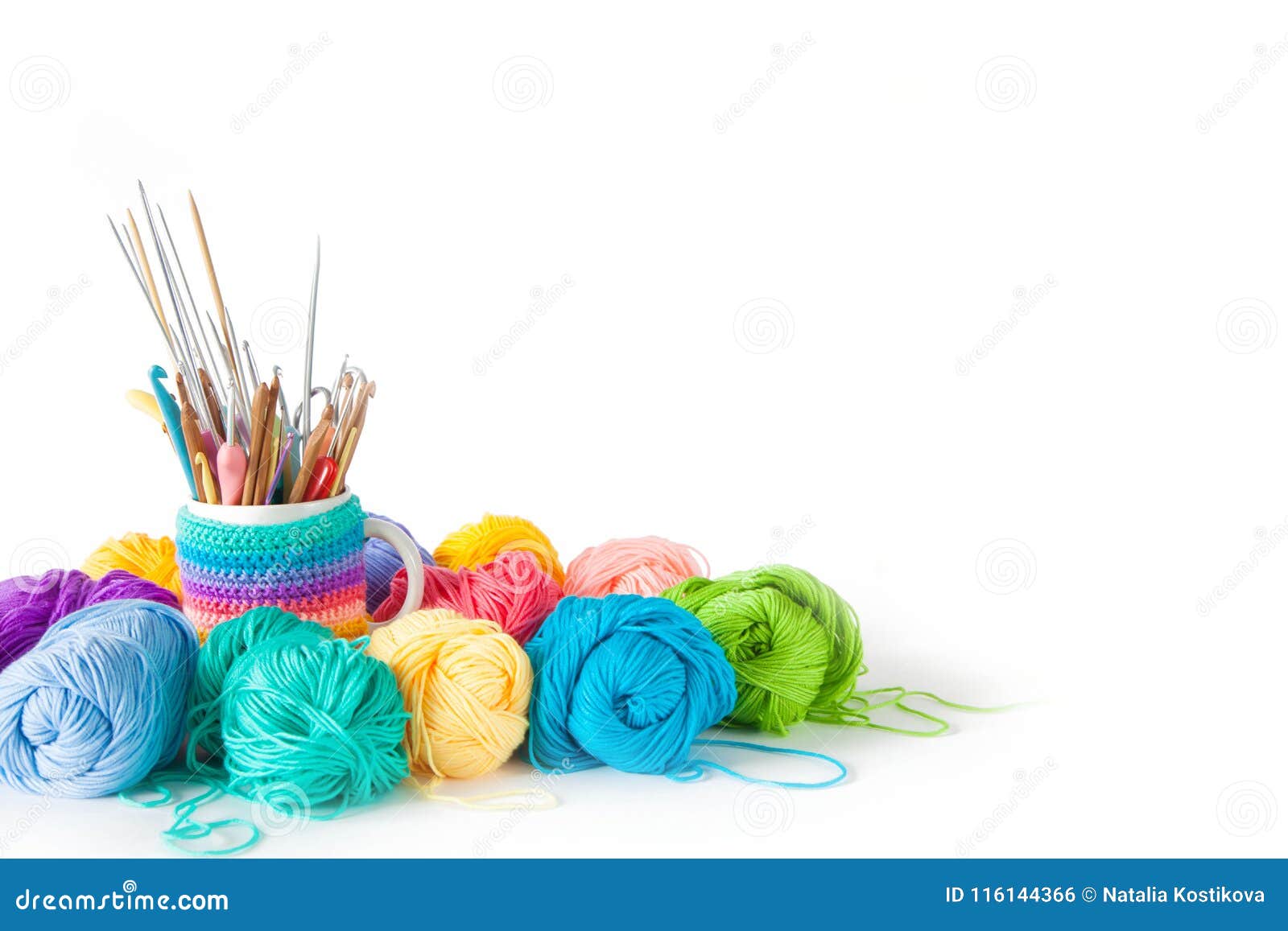 yarn balls for knitting and hooks, knitting needles.