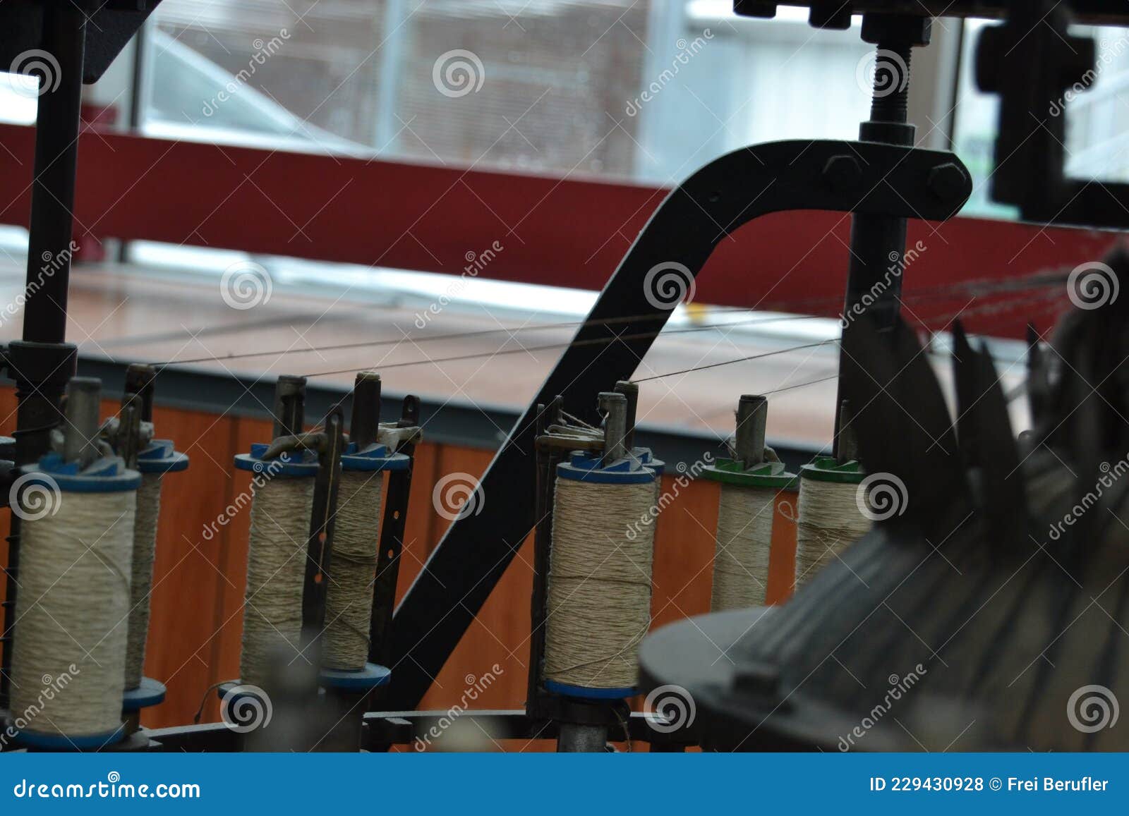 Yarn in a textile machine stock photo. Image of equipment 229430928