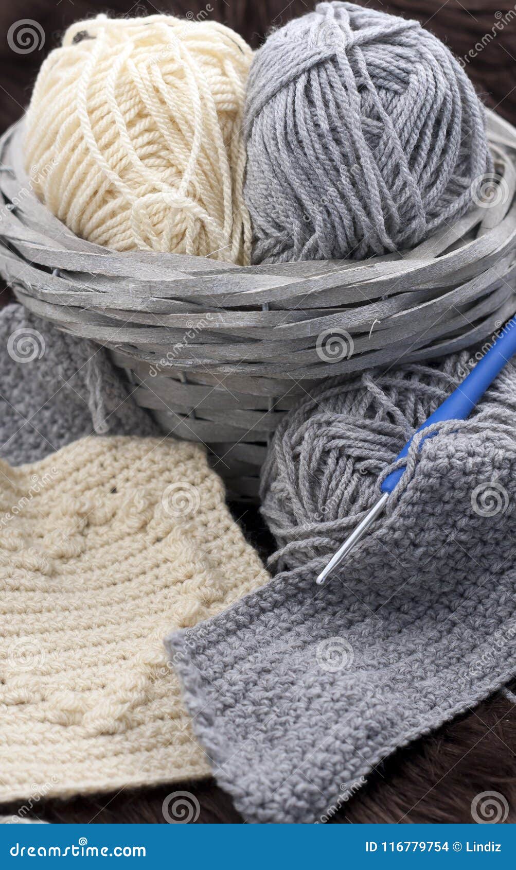 Yarns In Basket With Crochet Hooks In Harmonious Colors