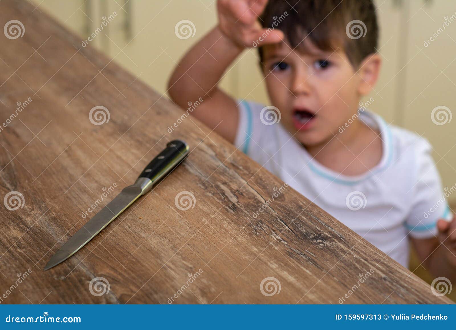 Child Little Boy Playing Dangerous Game With A Kitchen Knife Cut