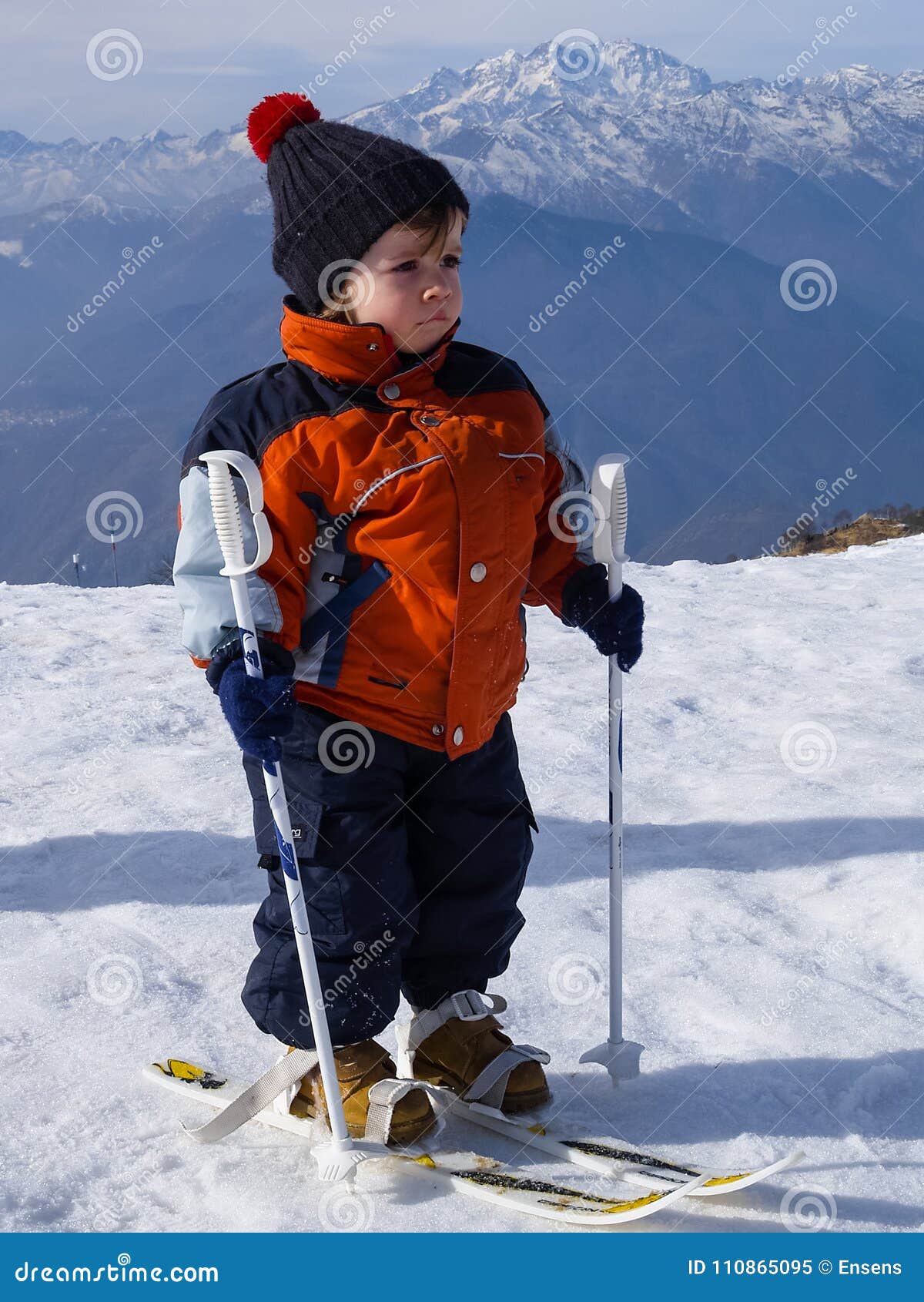 3-year-old Child On The Snow Learns To Ski Stock Image - Image Of