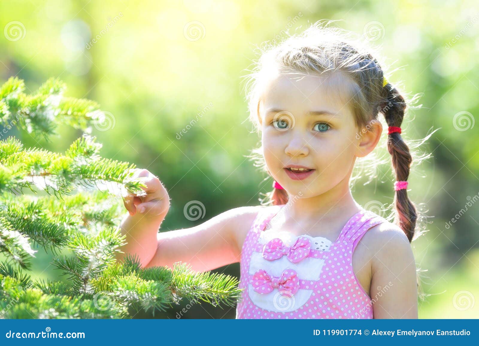 A 5 Year Old Girl in a Pink Dress in the Forest. Stock Photo - Image of ...