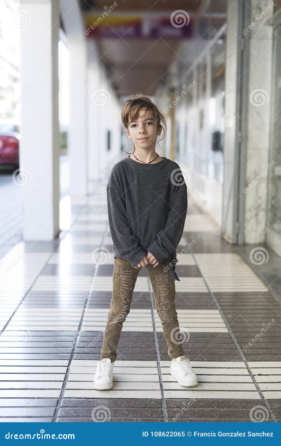 10-year-old girl who poses for some photos.