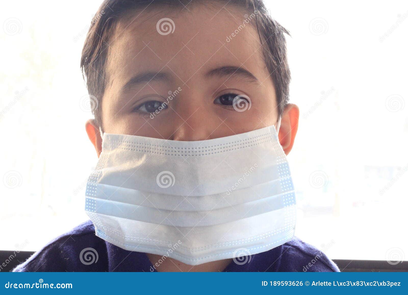 6-year-old latino boy with covid-19 prevention mask