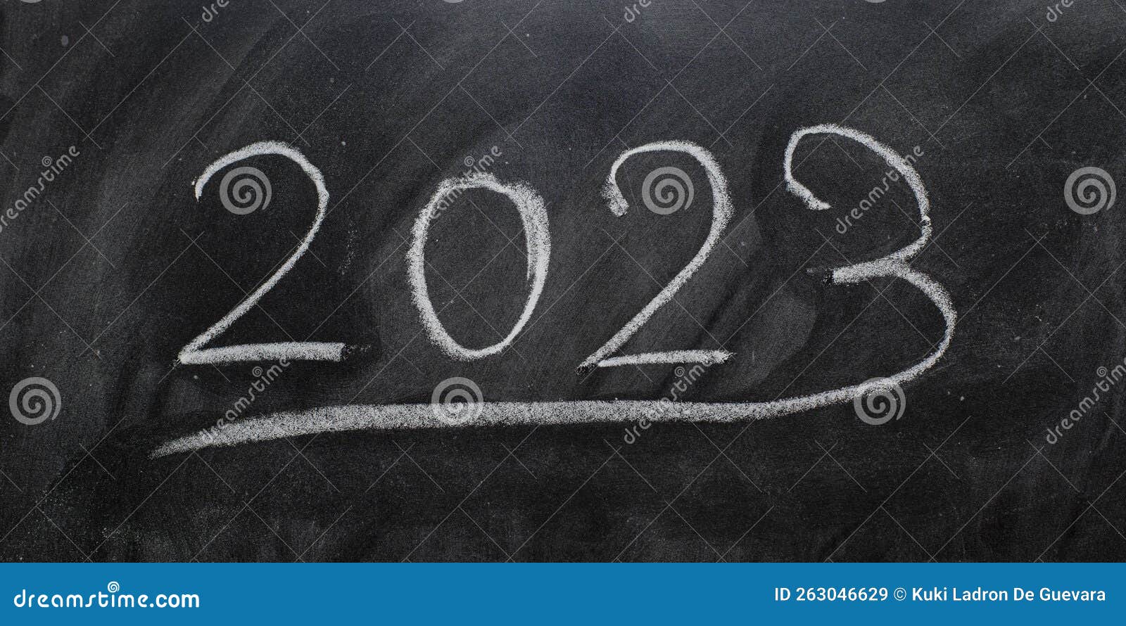 year 2023 written on a blackboard with chalk