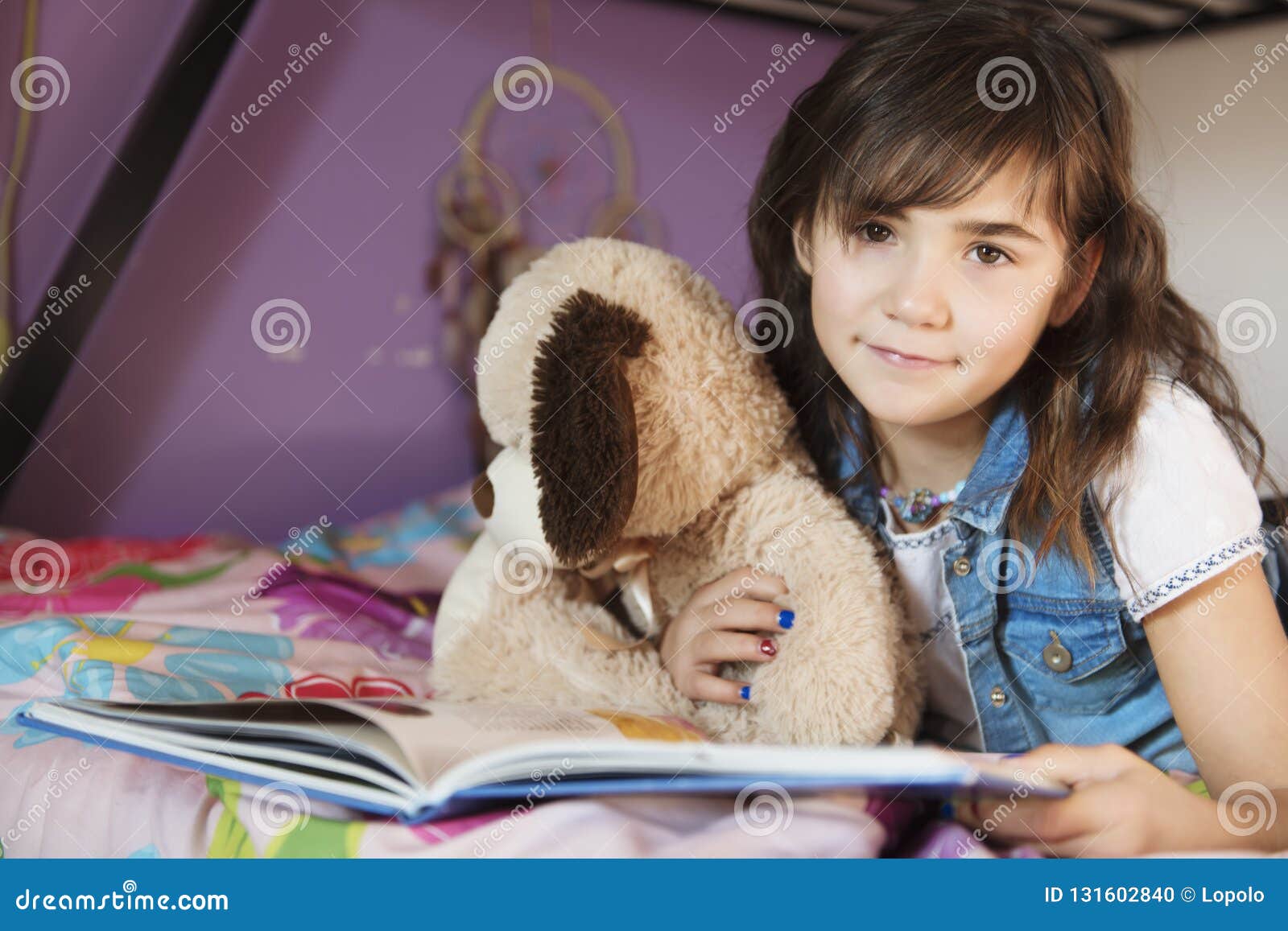7 Years Old Girl Reading a Book on Bed Stock Photo Image of bedroom