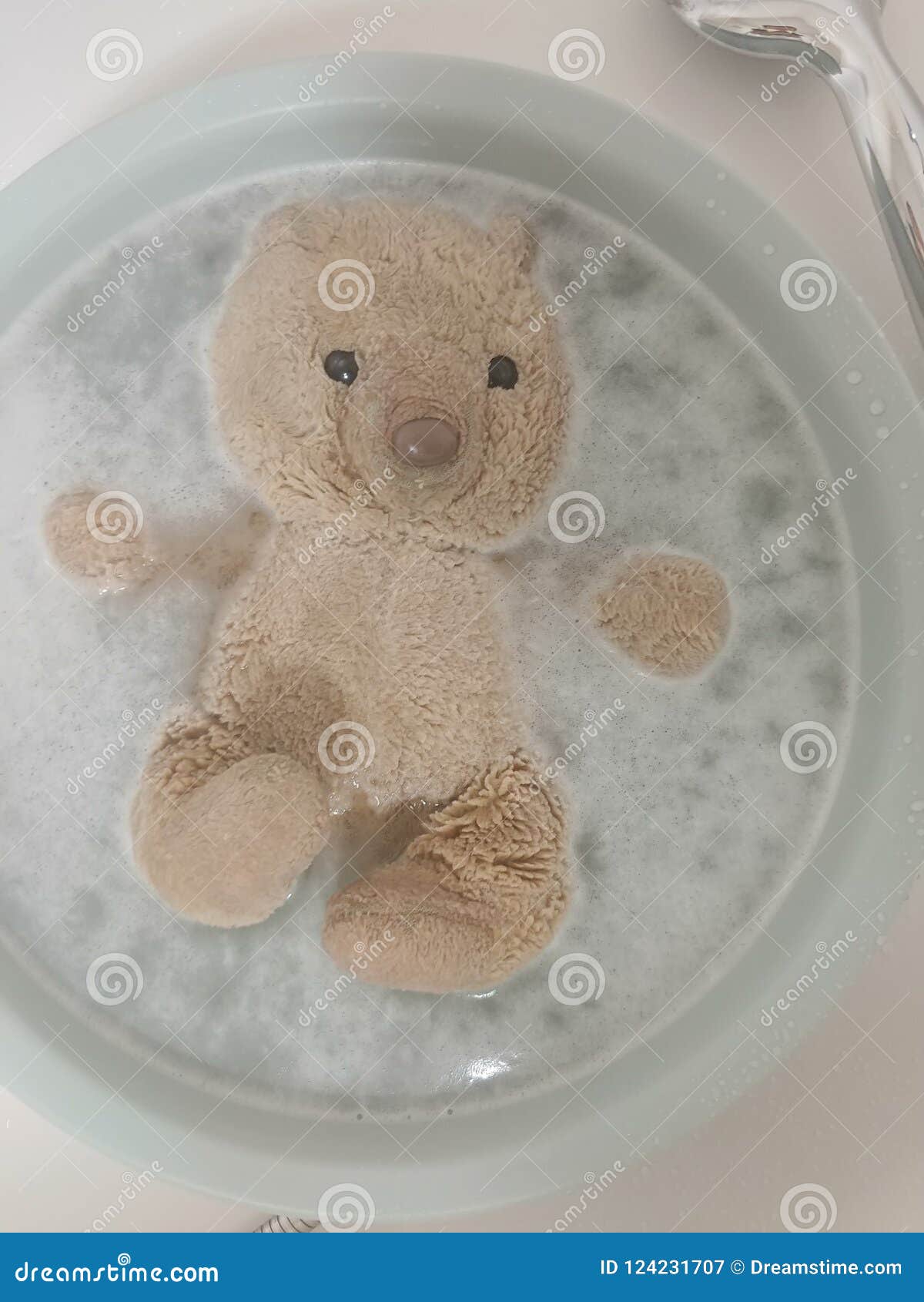 Teddy bear taking a bath stock image. Image of bubble 124231707
