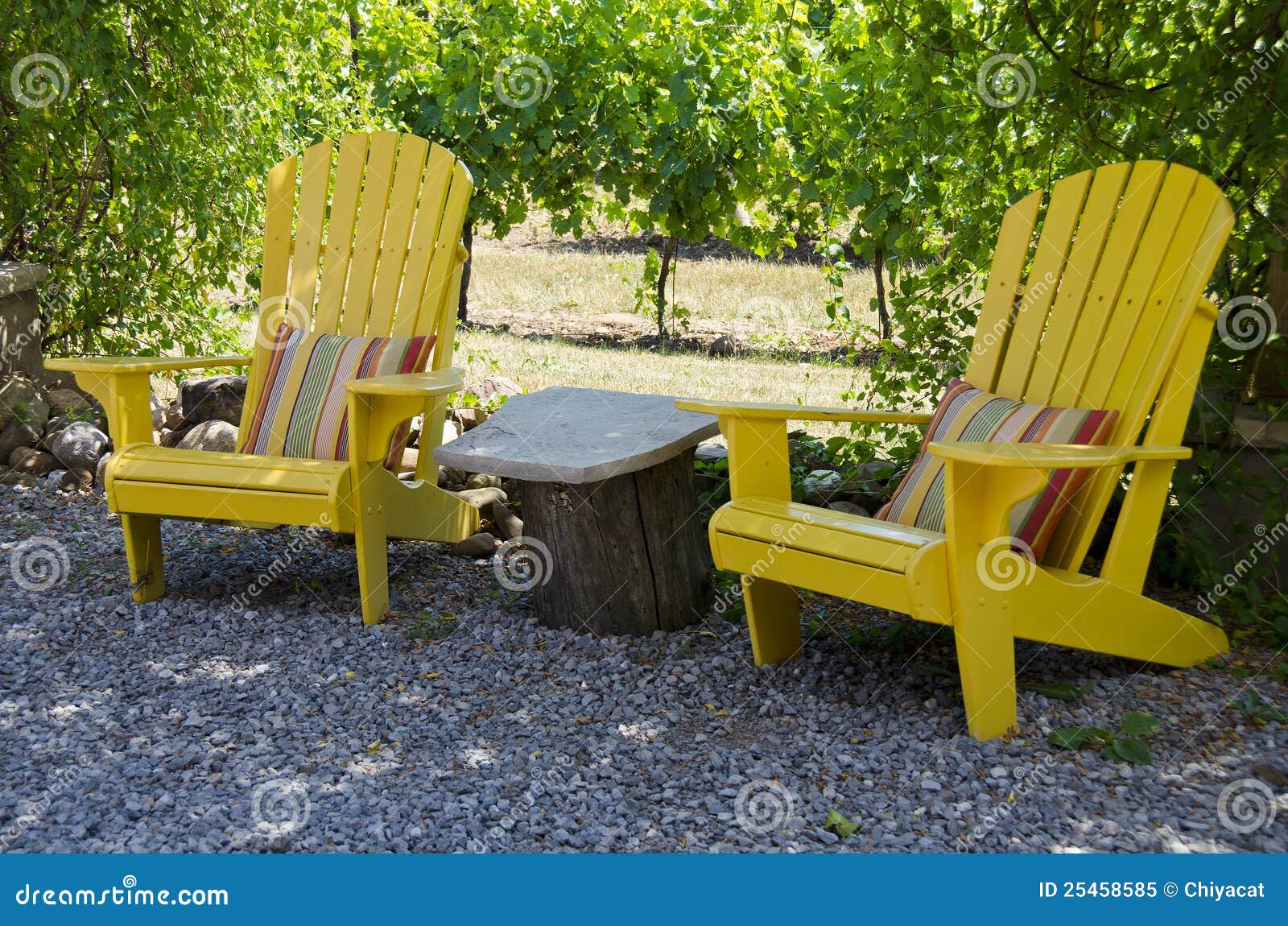 Yellow Adirondack Chairs On A Patio Stock Image Image Of Vines