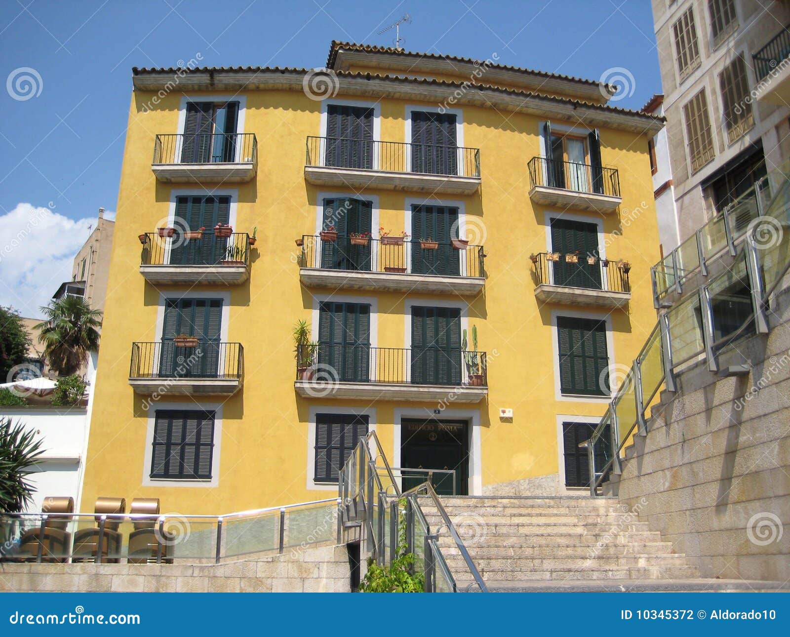 Yellow apartment building stock photo. Image of apartments 10345372