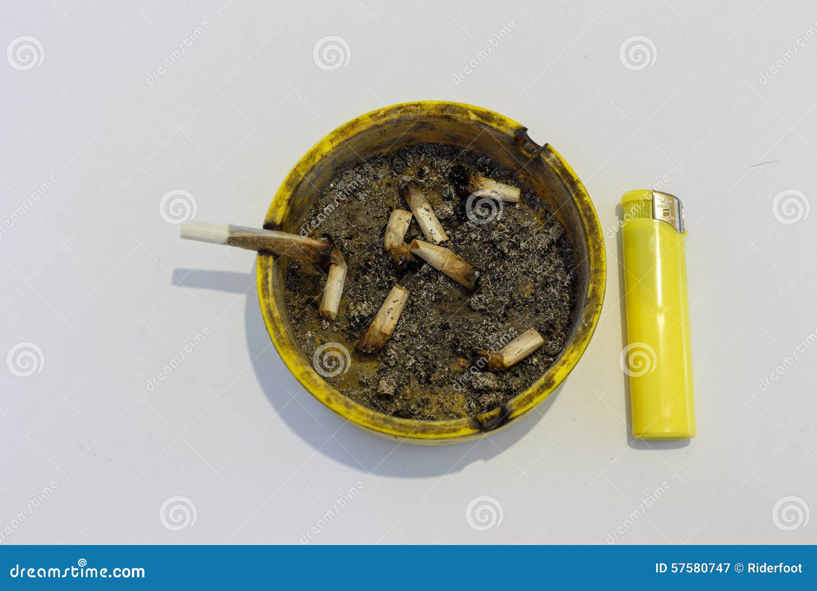 Yellow Ashtray with a Lighter and Cigar Stock Image Image of light